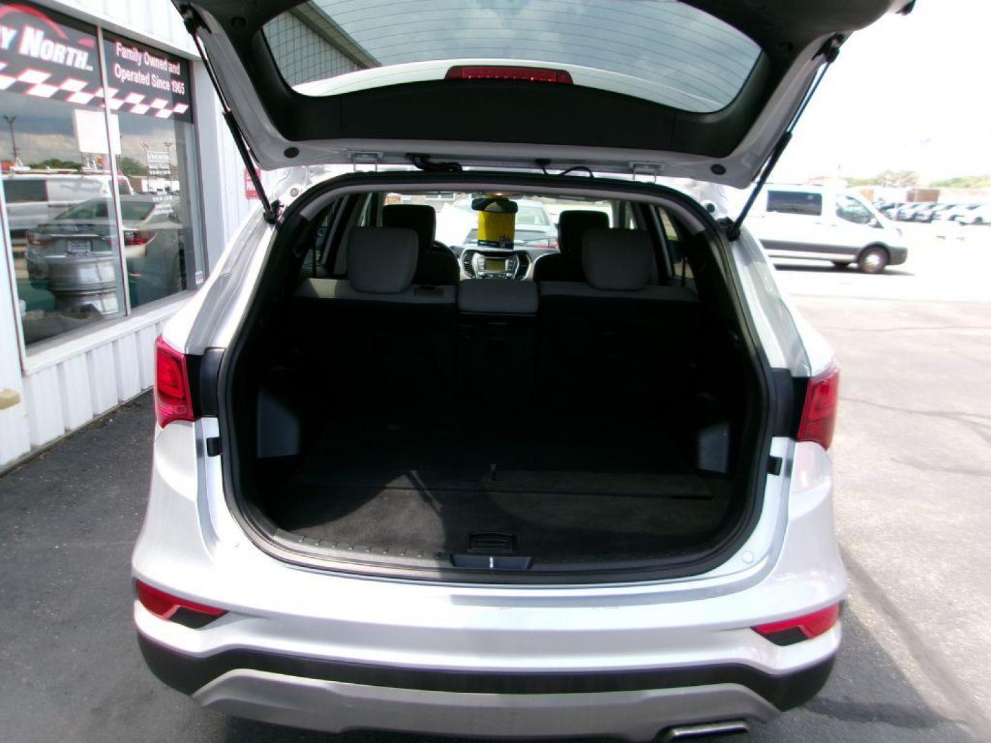 2018 SILVER HYUNDAI SANTA FE SPORT (5XYZT3LB0JG) with an 2.4L engine, Automatic transmission, located at 501 E. Columbia St., Springfield, OH, 45503, (800) 262-7122, 39.925262, -83.801796 - ***SPORT***New Tires***New Rear Brake Pads and Rotors*** Tune Up ***Serviced and Detailed*** Jay North Auto has offered hand picked vehicles since 1965! Our customer's enjoy a NO pressure buying experience with a small town feel. All of our vehicles get fully inspected and detailed. We are a pre - Photo#7