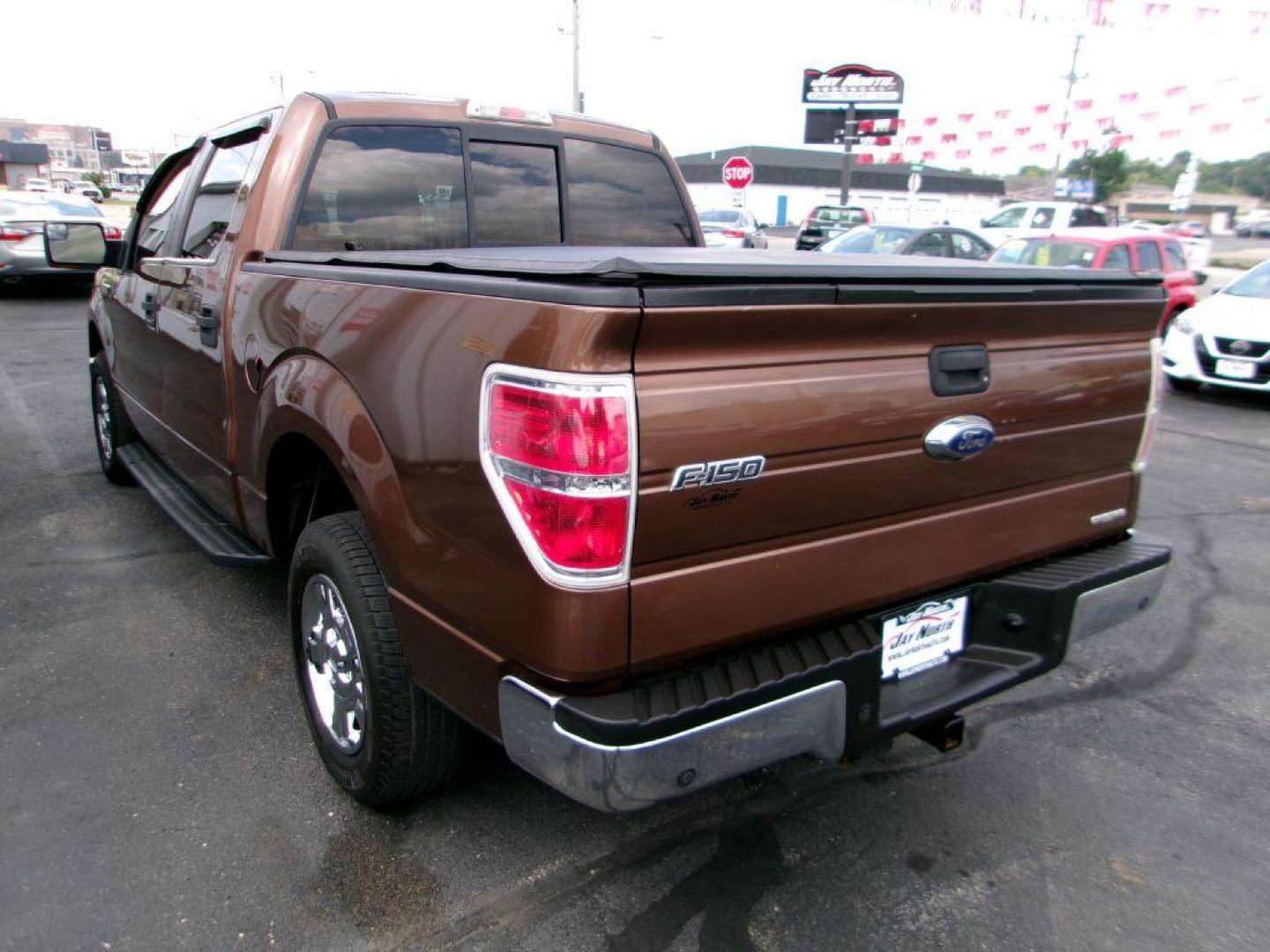 2011 BRONZE FORD F150 SUPERCREW (1FTEW1CM7BK) with an 3.7L engine, Automatic transmission, located at 501 E. Columbia St., Springfield, OH, 45503, (800) 262-7122, 39.925262, -83.801796 - ***Clean Carfax***XLT***Crew Cab***Power Sliding Rear Window***3.73 Limited Slip Axle***New Front Brake Pads and Rotors***Serviced and Detailed*** Jay North Auto has offered hand picked vehicles since 1965! Our customer's enjoy a NO pressure buying experience with a small town feel. All of our - Photo#5