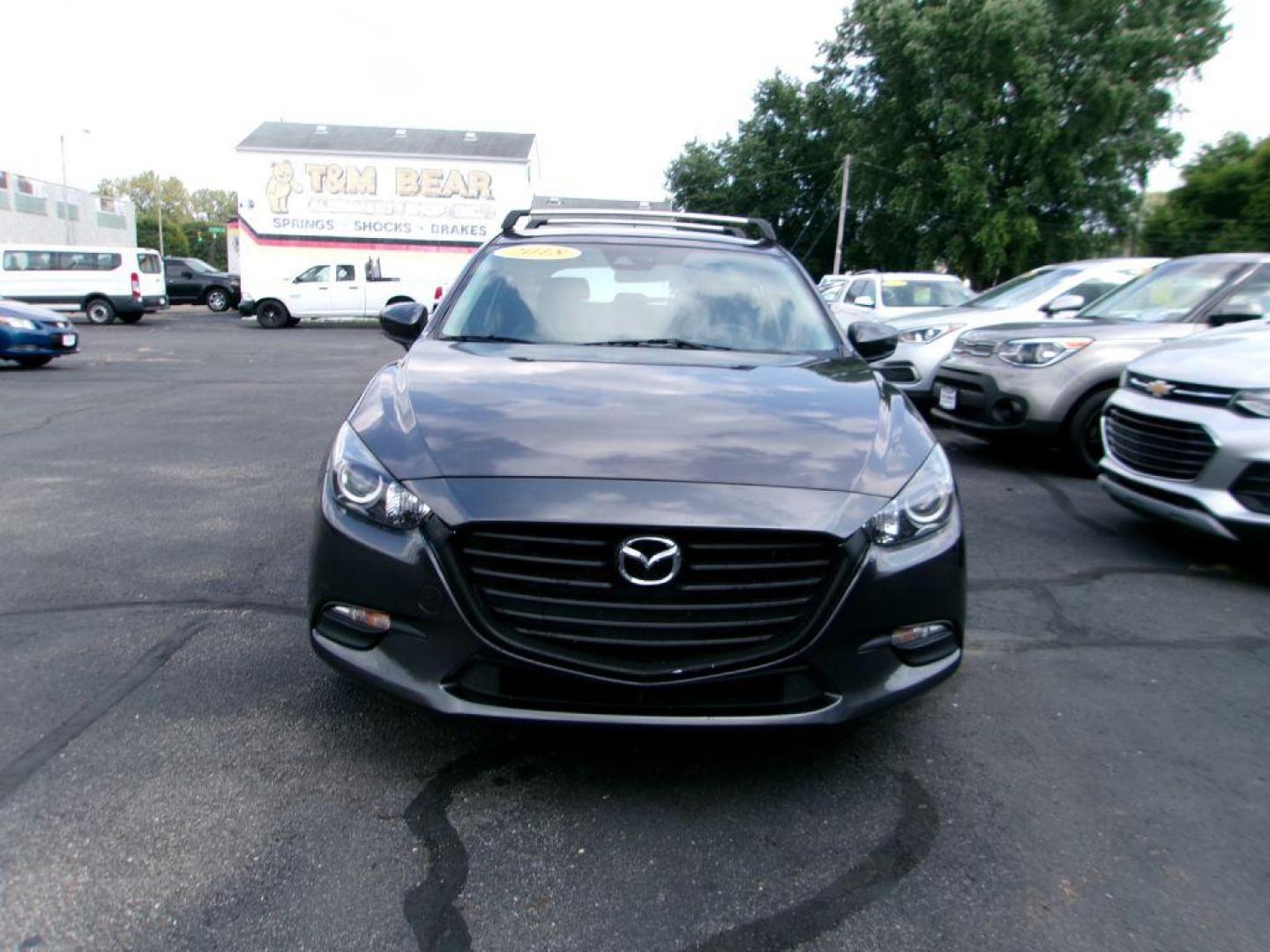 2018 GRAY MAZDA 3 TOURING (3MZBN1L36JM) with an 2.5L engine, Automatic transmission, located at 501 E. Columbia St., Springfield, OH, 45503, (800) 262-7122, 39.925262, -83.801796 - *** Leather w/ Heated Seats *** Serviced and Detailed *** Back Up Camera *** Touring *** NICE *** Jay North Auto has offered hand picked vehicles since 1965! Our customer's enjoy a NO pressure buying experience with a small town feel. All of our vehicles get fully inspected and detailed. We are - Photo#1