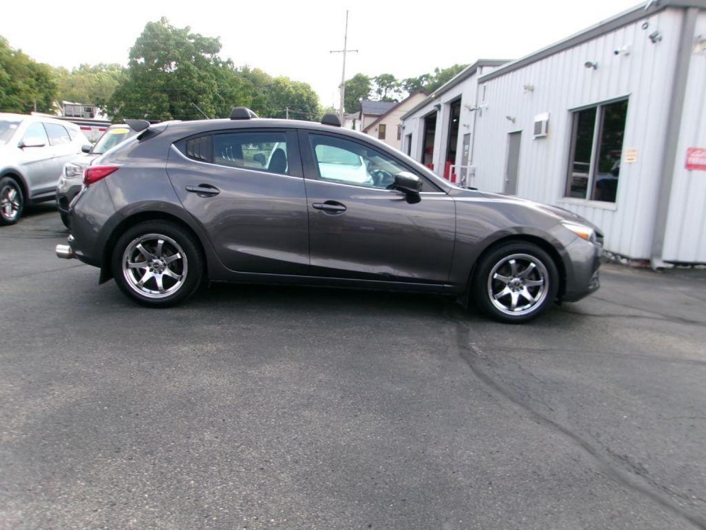 2018 GRAY MAZDA 3 TOURING (3MZBN1L36JM) with an 2.5L engine, Automatic transmission, located at 501 E. Columbia St., Springfield, OH, 45503, (800) 262-7122, 39.925262, -83.801796 - *** Leather w/ Heated Seats *** Serviced and Detailed *** Back Up Camera *** Touring *** NICE *** Jay North Auto has offered hand picked vehicles since 1965! Our customer's enjoy a NO pressure buying experience with a small town feel. All of our vehicles get fully inspected and detailed. We are - Photo#2