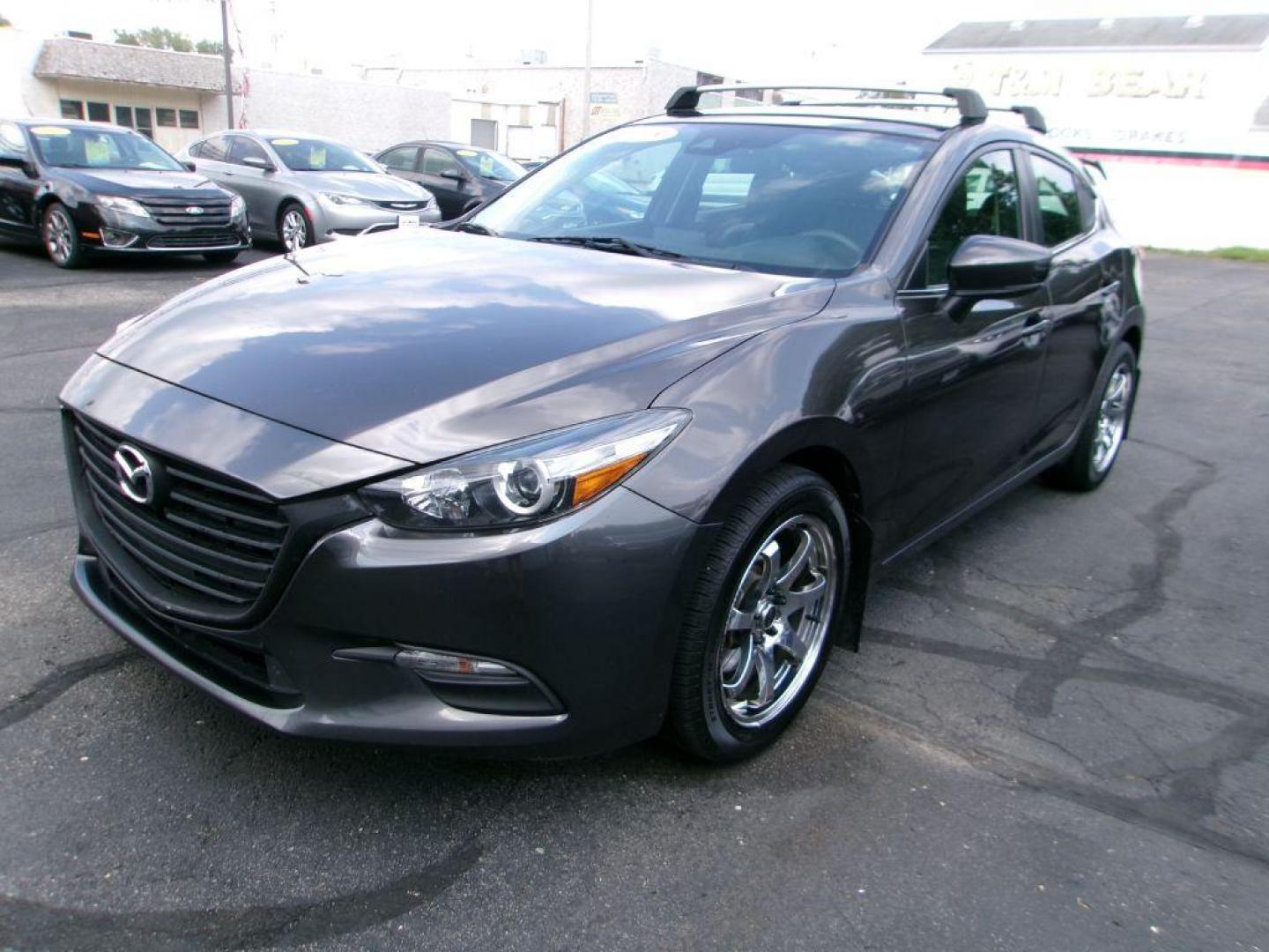 2018 GRAY MAZDA 3 TOURING (3MZBN1L36JM) with an 2.5L engine, Automatic transmission, located at 501 E. Columbia St., Springfield, OH, 45503, (800) 262-7122, 39.925262, -83.801796 - *** Leather w/ Heated Seats *** Serviced and Detailed *** Back Up Camera *** Touring *** NICE *** Jay North Auto has offered hand picked vehicles since 1965! Our customer's enjoy a NO pressure buying experience with a small town feel. All of our vehicles get fully inspected and detailed. We are - Photo#6