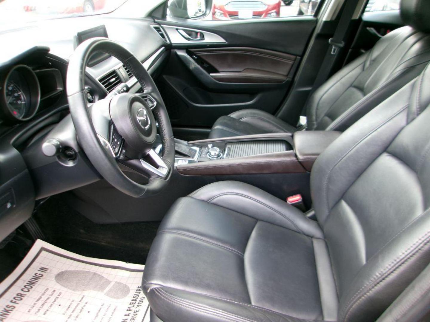 2018 GRAY MAZDA 3 TOURING (3MZBN1L36JM) with an 2.5L engine, Automatic transmission, located at 501 E. Columbia St., Springfield, OH, 45503, (800) 262-7122, 39.925262, -83.801796 - *** Leather w/ Heated Seats *** Serviced and Detailed *** Back Up Camera *** Touring *** NICE *** Jay North Auto has offered hand picked vehicles since 1965! Our customer's enjoy a NO pressure buying experience with a small town feel. All of our vehicles get fully inspected and detailed. We are - Photo#8