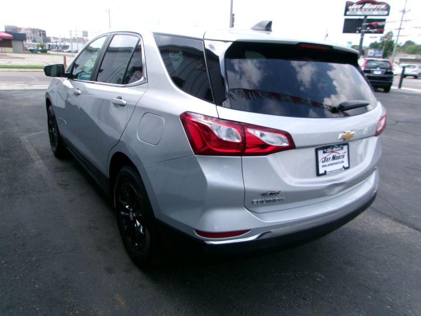 2021 SILVER CHEVROLET EQUINOX LT (3GNAXJEV5MS) with an 1.5L engine, Automatic transmission, located at 501 E. Columbia St., Springfield, OH, 45503, (800) 262-7122, 39.925262, -83.801796 - *** New Tires *** Tune Up *** New Brakes *** Serviced and Detailed *** Back Up Camera *** Lane Departure Warning w/ Blind zone *** 28 MPG *** FWD *** Jay North Auto has offered hand picked vehicles since 1965! Our customer's enjoy a NO pressure buying experience with a small town feel. All of o - Photo#5