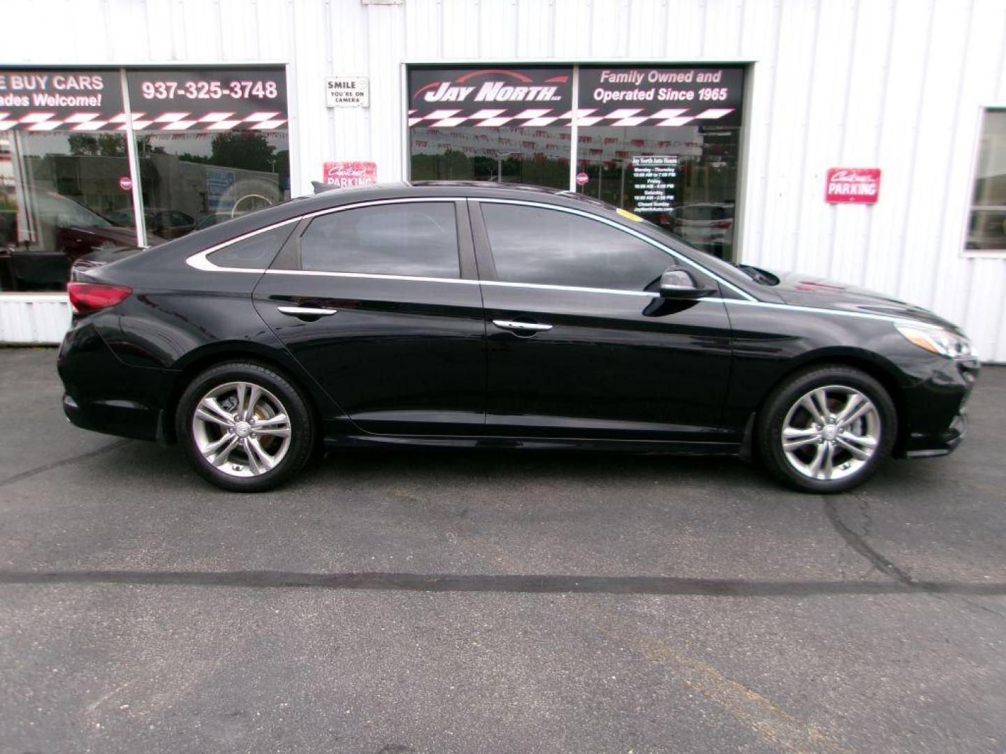 2018 BLACK HYUNDAI SONATA SEL (5NPE34AF4JH) with an 2.4L engine, Automatic transmission, located at 501 E. Columbia St., Springfield, OH, 45503, (800) 262-7122, 39.925262, -83.801796 - ADVANCED SAFETY TECHNOLOGY Blind Spot Detection System w/ Rear Cross-Traffic Alert INCLUDED Vehicle Stability Management (VSM) w/ Traction Control INCLUDED ABS w/ Electronic Brake Force Distribution and Brake Assist INCLUDED Front, Front Side Impact, Side Curtain and Driver Knee Airbags - Photo#1