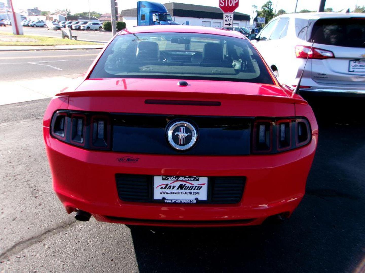 2014 RED FORD MUSTANG PREMIUM (1ZVBP8AM6E5) with an 3.7L engine, Automatic transmission, located at 501 E. Columbia St., Springfield, OH, 45503, (800) 262-7122, 39.925262, -83.801796 - *** New Brakes *** New Struts *** Premium *** Shaker Audio *** Pony Pkg. *** 18'' Wheels *** Serviced and Detailed *** Jay North Auto has offered hand picked vehicles since 1965! Our customer's enjoy a NO pressure buying experience with a small town feel. All of our vehicles get fully inspected - Photo#4