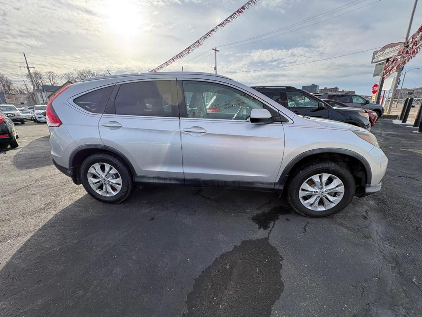 2012 SILVER HONDA CR-V EXL (2HKRM3H77CH) with an 2.4L engine, Automatic transmission, located at 501 E. Columbia St., Springfield, OH, 45503, (800) 262-7122, 39.925262, -83.801796 - *** New Tires*** Updated Timing w/ Honda Parts *** New Brakes *** Tune Up *** New Front Struts *** New Wipers *** New Battery *** Serviced and Detailed *** EXL *** FWD *** Jay North Auto has offered hand picked vehicles since 1965! Our customer's enjoy a NO pressure buying experience with a sma - Photo#1