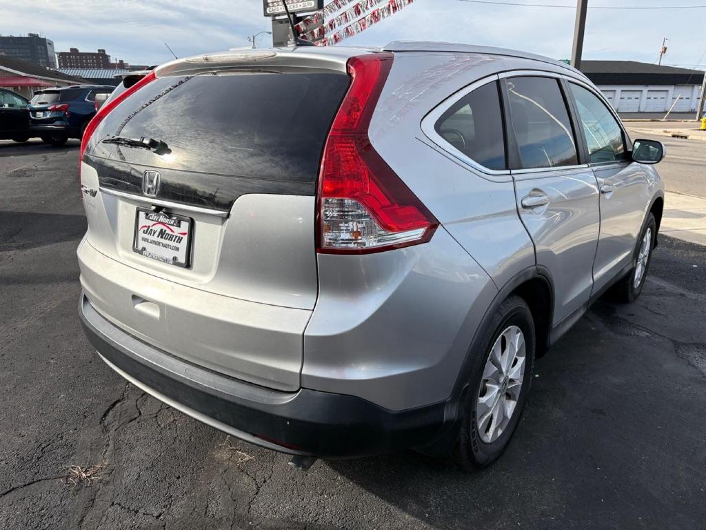 2012 SILVER HONDA CR-V EXL (2HKRM3H77CH) with an 2.4L engine, Automatic transmission, located at 501 E. Columbia St., Springfield, OH, 45503, (800) 262-7122, 39.925262, -83.801796 - *** New Tires*** Updated Timing w/ Honda Parts *** New Brakes *** Tune Up *** New Front Struts *** New Wipers *** New Battery *** Serviced and Detailed *** EXL *** FWD *** Jay North Auto has offered hand picked vehicles since 1965! Our customer's enjoy a NO pressure buying experience with a sma - Photo#2