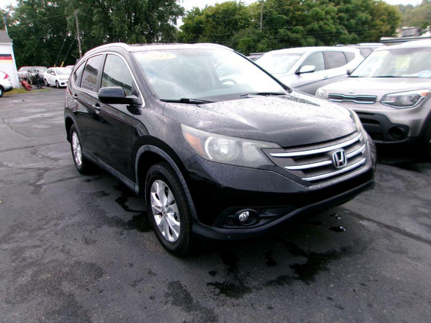 2012 BLACK HONDA CR-V EXL (5J6RM4H72CL) with an 2.4L engine, Automatic transmission, located at 501 E. Columbia St., Springfield, OH, 45503, (800) 262-7122, 39.925262, -83.801796 - ***Clean Carfax***AWD***EX-L***New Front and Rear Brake Pads and Rotors***Updated Timing***New Spark Plugs***Serviced and Detailed*** Jay North Auto has offered hand picked vehicles since 1965! Our customer's enjoy a NO pressure buying experience with a small town feel. All of our vehicles get - Photo#0