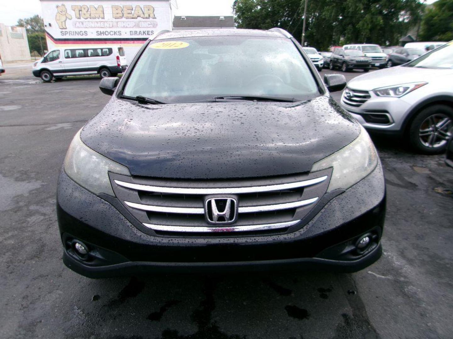 2012 BLACK HONDA CR-V EXL (5J6RM4H72CL) with an 2.4L engine, Automatic transmission, located at 501 E. Columbia St., Springfield, OH, 45503, (800) 262-7122, 39.925262, -83.801796 - ***Clean Carfax***AWD***EX-L***New Front and Rear Brake Pads and Rotors***Updated Timing***New Spark Plugs***Serviced and Detailed*** Jay North Auto has offered hand picked vehicles since 1965! Our customer's enjoy a NO pressure buying experience with a small town feel. All of our vehicles get - Photo#1