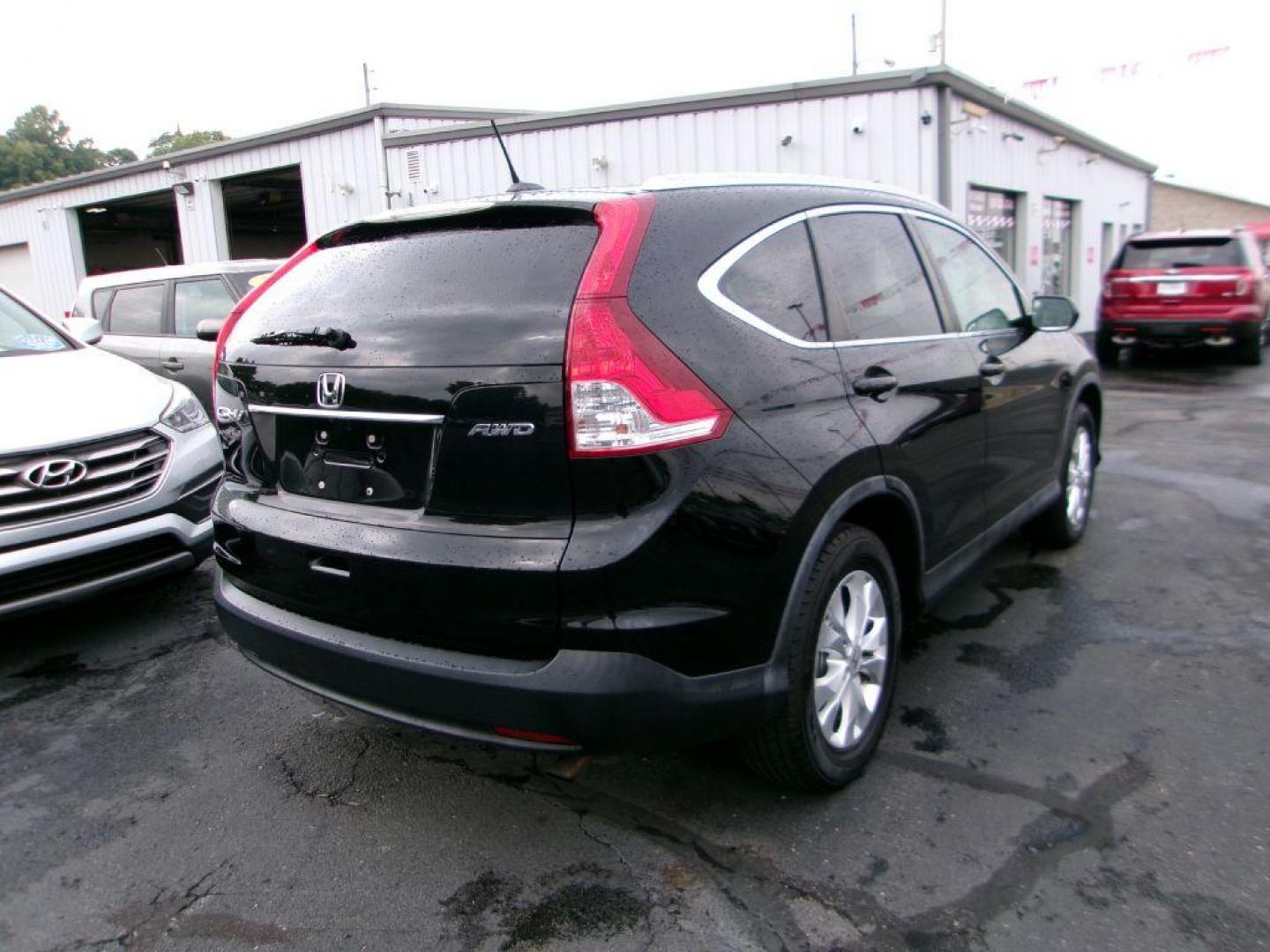 2012 BLACK HONDA CR-V EXL (5J6RM4H72CL) with an 2.4L engine, Automatic transmission, located at 501 E. Columbia St., Springfield, OH, 45503, (800) 262-7122, 39.925262, -83.801796 - ***Clean Carfax***AWD***EX-L***New Front and Rear Brake Pads and Rotors***Updated Timing***New Spark Plugs***Serviced and Detailed*** Jay North Auto has offered hand picked vehicles since 1965! Our customer's enjoy a NO pressure buying experience with a small town feel. All of our vehicles get - Photo#3
