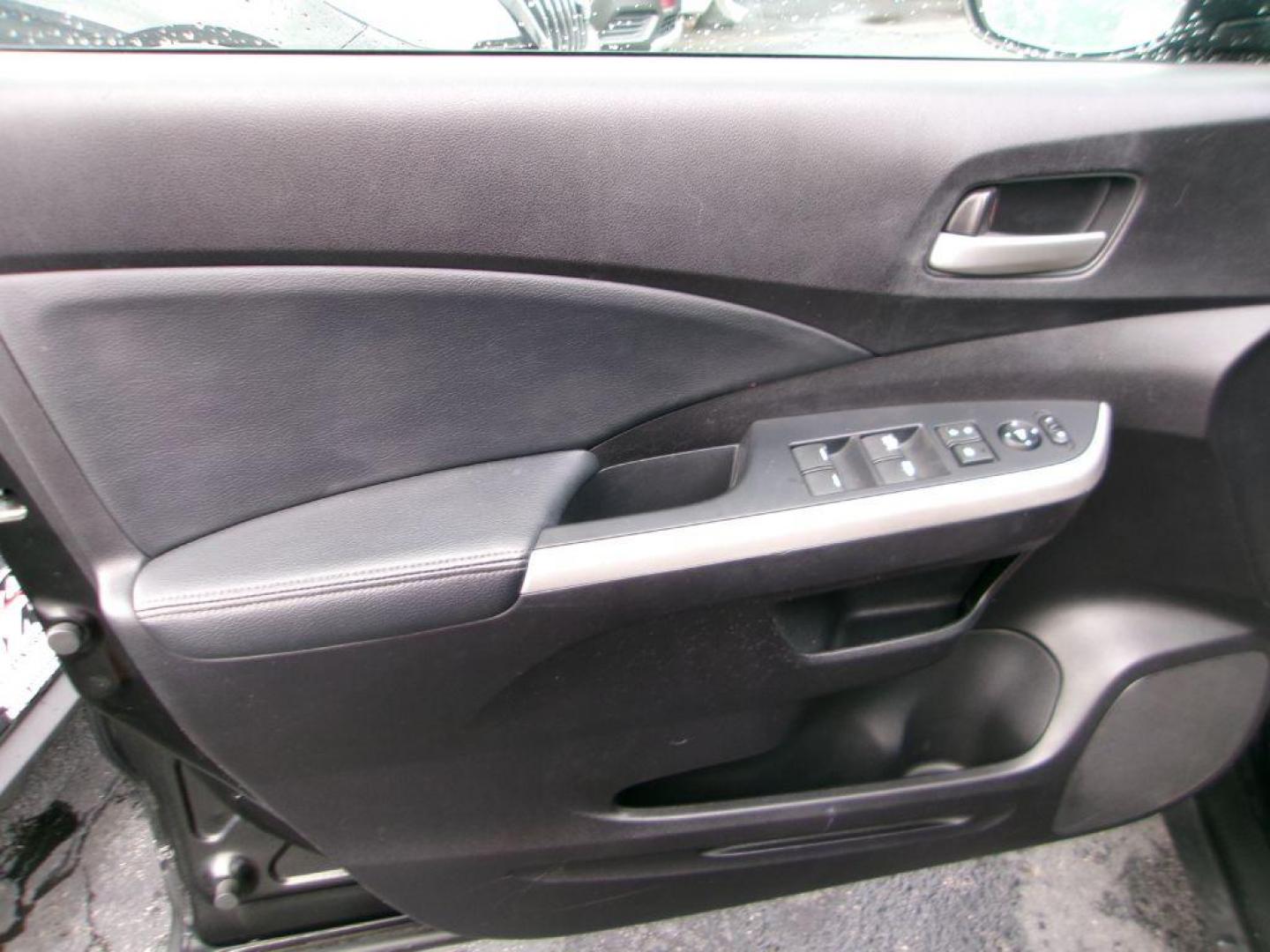 2012 BLACK HONDA CR-V EXL (5J6RM4H72CL) with an 2.4L engine, Automatic transmission, located at 501 E. Columbia St., Springfield, OH, 45503, (800) 262-7122, 39.925262, -83.801796 - ***Clean Carfax***AWD***EX-L***New Front and Rear Brake Pads and Rotors***Updated Timing***New Spark Plugs***Serviced and Detailed*** Jay North Auto has offered hand picked vehicles since 1965! Our customer's enjoy a NO pressure buying experience with a small town feel. All of our vehicles get - Photo#7
