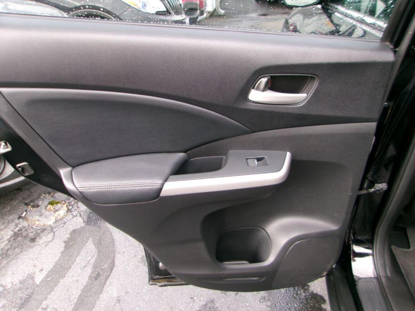 2012 BLACK HONDA CR-V EXL (5J6RM4H72CL) with an 2.4L engine, Automatic transmission, located at 501 E. Columbia St., Springfield, OH, 45503, (800) 262-7122, 39.925262, -83.801796 - ***Clean Carfax***AWD***EX-L***New Front and Rear Brake Pads and Rotors***Updated Timing***New Spark Plugs***Serviced and Detailed*** Jay North Auto has offered hand picked vehicles since 1965! Our customer's enjoy a NO pressure buying experience with a small town feel. All of our vehicles get - Photo#11