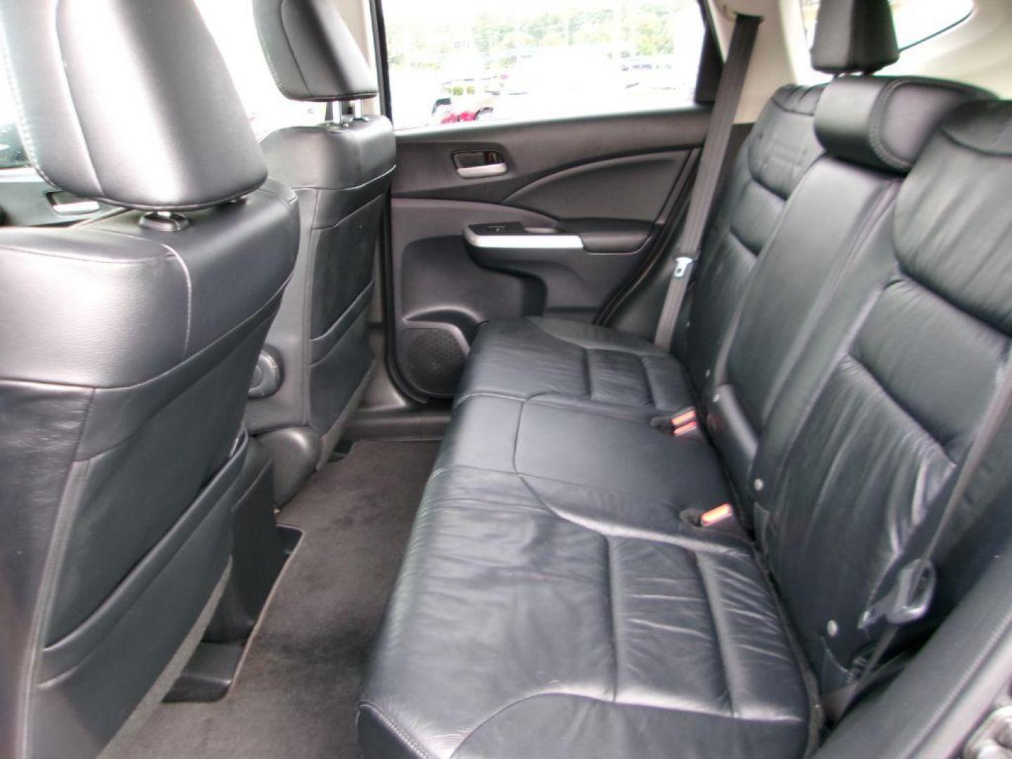 2012 BLACK HONDA CR-V EXL (5J6RM4H72CL) with an 2.4L engine, Automatic transmission, located at 501 E. Columbia St., Springfield, OH, 45503, (800) 262-7122, 39.925262, -83.801796 - ***Clean Carfax***AWD***EX-L***New Front and Rear Brake Pads and Rotors***Updated Timing***New Spark Plugs***Serviced and Detailed*** Jay North Auto has offered hand picked vehicles since 1965! Our customer's enjoy a NO pressure buying experience with a small town feel. All of our vehicles get - Photo#12