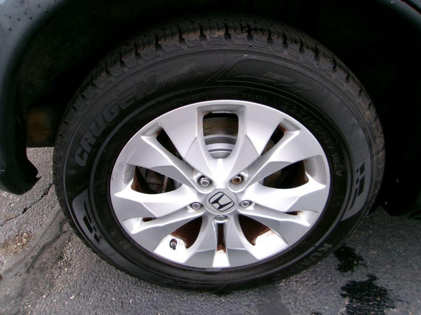 2012 BLACK HONDA CR-V EXL (5J6RM4H72CL) with an 2.4L engine, Automatic transmission, located at 501 E. Columbia St., Springfield, OH, 45503, (800) 262-7122, 39.925262, -83.801796 - ***Clean Carfax***AWD***EX-L***New Front and Rear Brake Pads and Rotors***Updated Timing***New Spark Plugs***Serviced and Detailed*** Jay North Auto has offered hand picked vehicles since 1965! Our customer's enjoy a NO pressure buying experience with a small town feel. All of our vehicles get - Photo#19