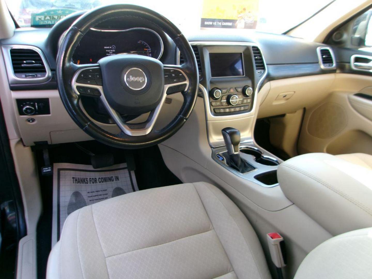2020 BLACK JEEP GRAND CHEROKEE LAREDO (1C4RJFAG1LC) with an 3.6L engine, Automatic transmission, located at 501 E. Columbia St., Springfield, OH, 45503, (800) 262-7122, 39.925262, -83.801796 - ***Grand Cherokee***Lardeo E***Apple Carplay and Android Auto***4X4***Blind Spot***Cross-Path Detection***New Front and Rear Brake Pads and Rotors***New Tires***Serviced and Detailed*** Jay North Auto has offered hand picked vehicles since 1965! Our customer's enjoy a NO pressure buying experie - Photo#9
