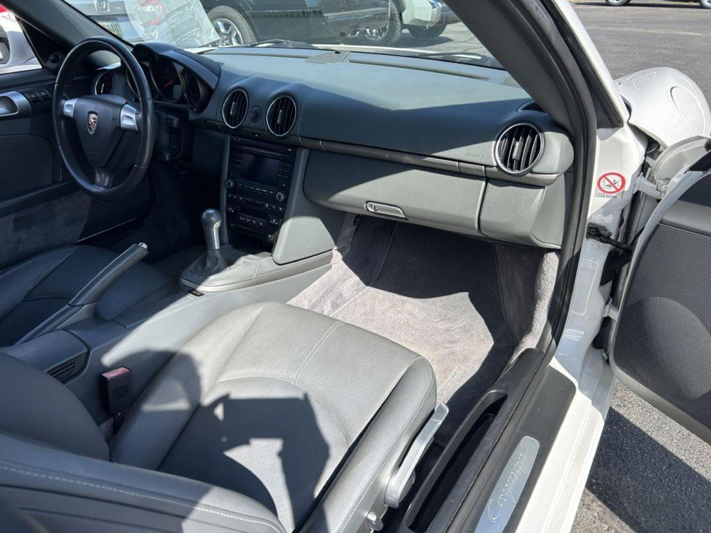 2009 WHITE PORSCHE CAYMAN (WP0AA29849U) with an 2.9L engine, 6-Speed Manual transmission, located at 501 E. Columbia St., Springfield, OH, 45503, (800) 262-7122, 39.925262, -83.801796 - ***6 Speed Manual!!*** 2009 987.2 Cayman 2.9L For those in the know, the 987.2 Cayman (2009-2012) is the sweet spot -- continuing the light weight body of the original Cayman while introducing the newer, ultra reliable 9A1 engine series that eliminated the troublesome IMS bearings that caused so - Photo#12