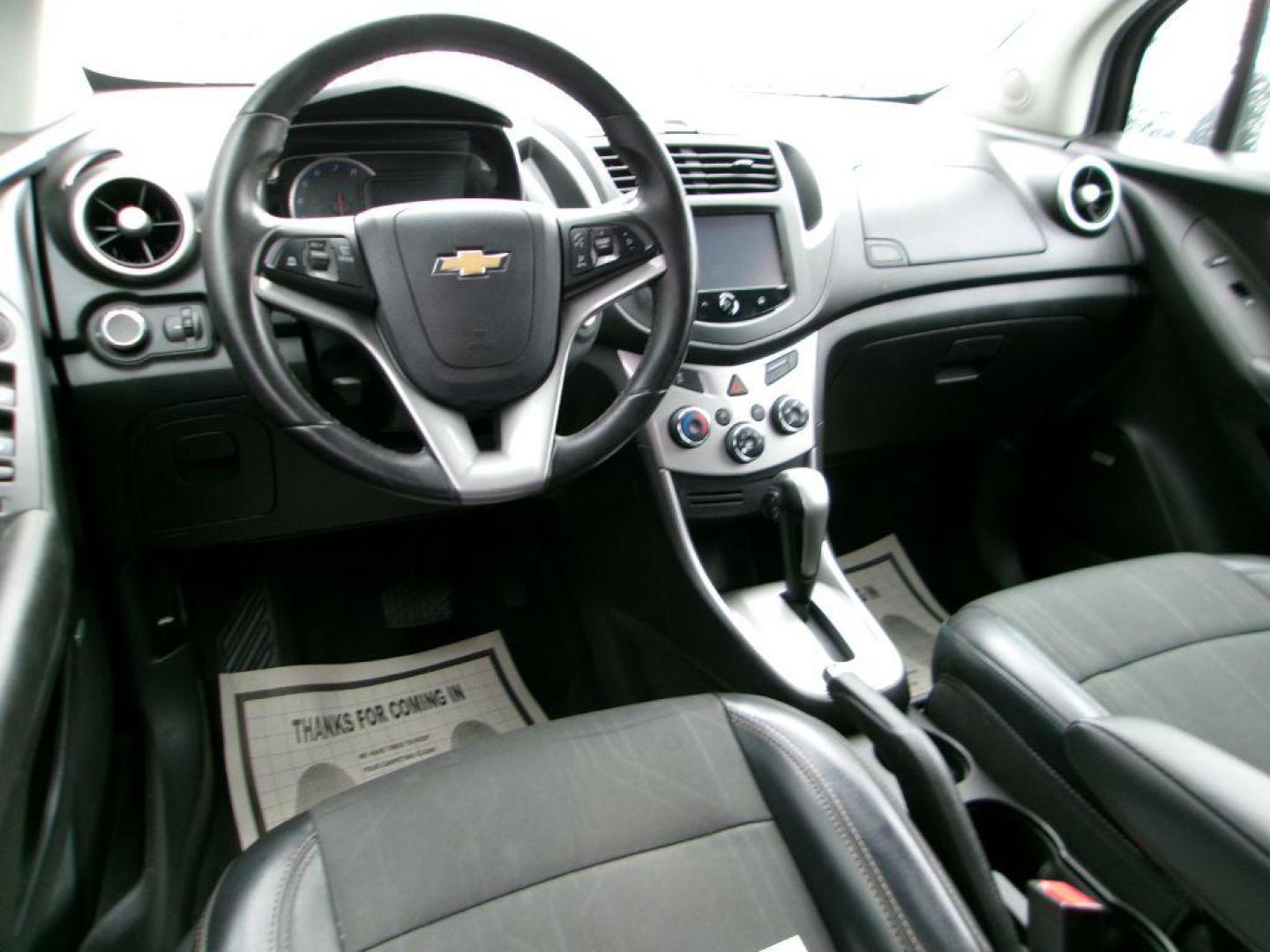 2015 BLACK CHEVROLET TRAX 1LT (KL7CJLSB9FB) with an 1.4L engine, Automatic transmission, located at 501 E. Columbia St., Springfield, OH, 45503, (800) 262-7122, 39.925262, -83.801796 - *** New Tires *** 1 Owner *** 33 Service Records on CarFax *** FWD LT *** Tune Up *** New Bakes *** Jay North Auto has offered hand picked vehicles since 1965! Our customer's enjoy a NO pressure buying experience with a small town feel. All of our vehicles get fully inspected and detailed. We a - Photo#10