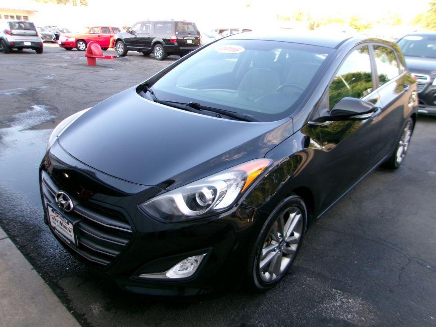 2016 BLACK HYUNDAI ELANTRA GT (KMHD35LH1GU) with an 2.0L engine, Automatic transmission, located at 501 E. Columbia St., Springfield, OH, 45503, (800) 262-7122, 39.925262, -83.801796 - *** Clean CarFax w/ 33 Service Records *** Tune Up *** New Brakes w/ New Calipers *** Serviced *** New Wipers *** Jay North Auto has offered hand picked vehicles since 1965! Our customer's enjoy a NO pressure buying experience with a small town feel. All of our vehicles get fully inspected and - Photo#2