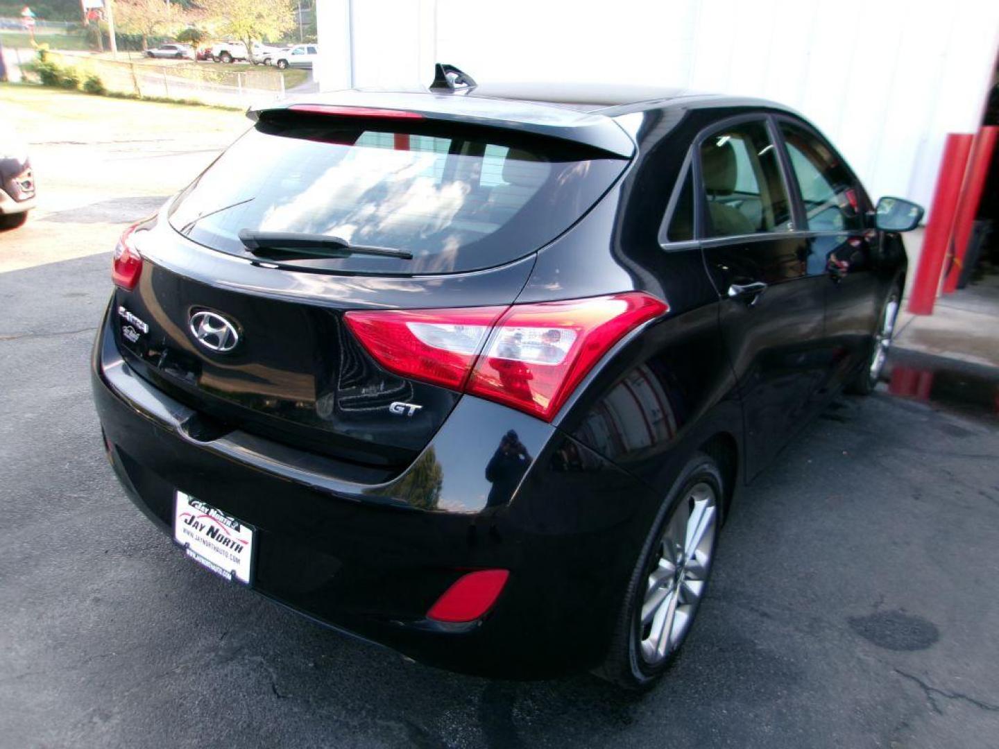 2016 BLACK HYUNDAI ELANTRA GT (KMHD35LH1GU) with an 2.0L engine, Automatic transmission, located at 501 E. Columbia St., Springfield, OH, 45503, (800) 262-7122, 39.925262, -83.801796 - *** Clean CarFax w/ 33 Service Records *** Tune Up *** New Brakes w/ New Calipers *** Serviced *** New Wipers *** Jay North Auto has offered hand picked vehicles since 1965! Our customer's enjoy a NO pressure buying experience with a small town feel. All of our vehicles get fully inspected and - Photo#6