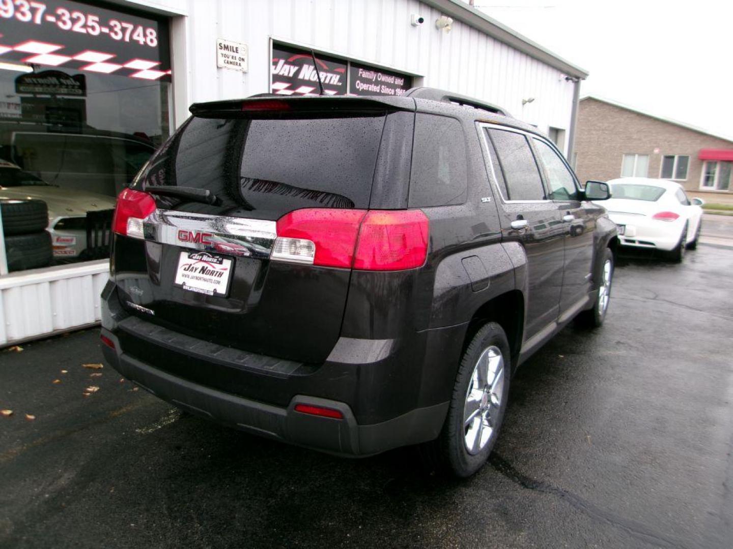 2014 GRAY GMC TERRAIN SLT (2GKALSEK5E6) with an 2.4L engine, Automatic transmission, located at 501 E. Columbia St., Springfield, OH, 45503, (800) 262-7122, 39.925262, -83.801796 - *** SLT *** FWD *** Leather *** Moonroof *** Power Liftgate *** Pioneer Audio *** New Tires *** Serviced and Detailed *** Jay North Auto has offered hand picked vehicles since 1965! Our customer's enjoy a NO pressure buying experience with a small town feel. All of our vehicles get fully inspect - Photo#3