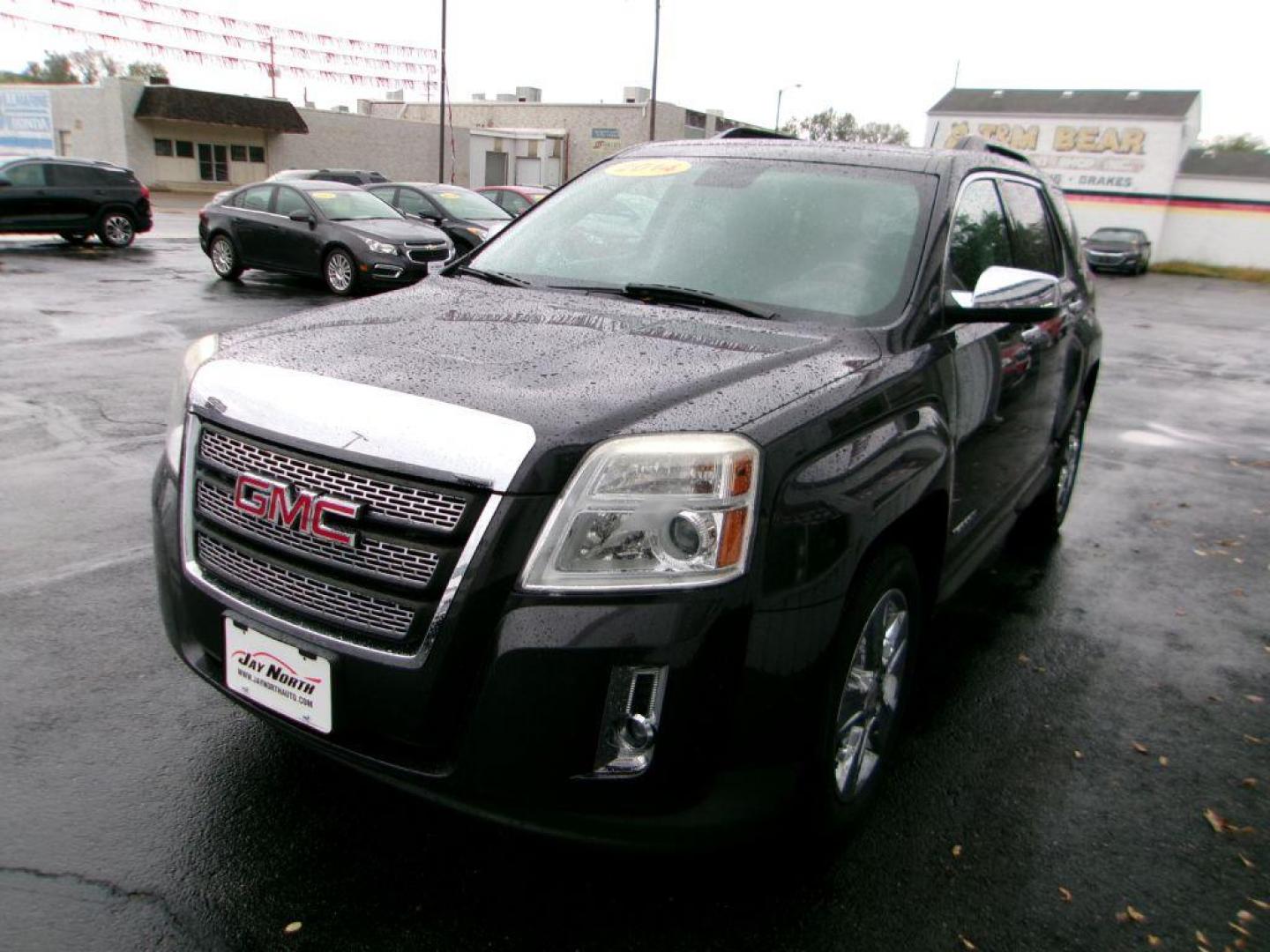 2014 GRAY GMC TERRAIN SLT (2GKALSEK5E6) with an 2.4L engine, Automatic transmission, located at 501 E. Columbia St., Springfield, OH, 45503, (800) 262-7122, 39.925262, -83.801796 - *** SLT *** FWD *** Leather *** Moonroof *** Power Liftgate *** Pioneer Audio *** New Tires *** Serviced and Detailed *** Jay North Auto has offered hand picked vehicles since 1965! Our customer's enjoy a NO pressure buying experience with a small town feel. All of our vehicles get fully inspect - Photo#6