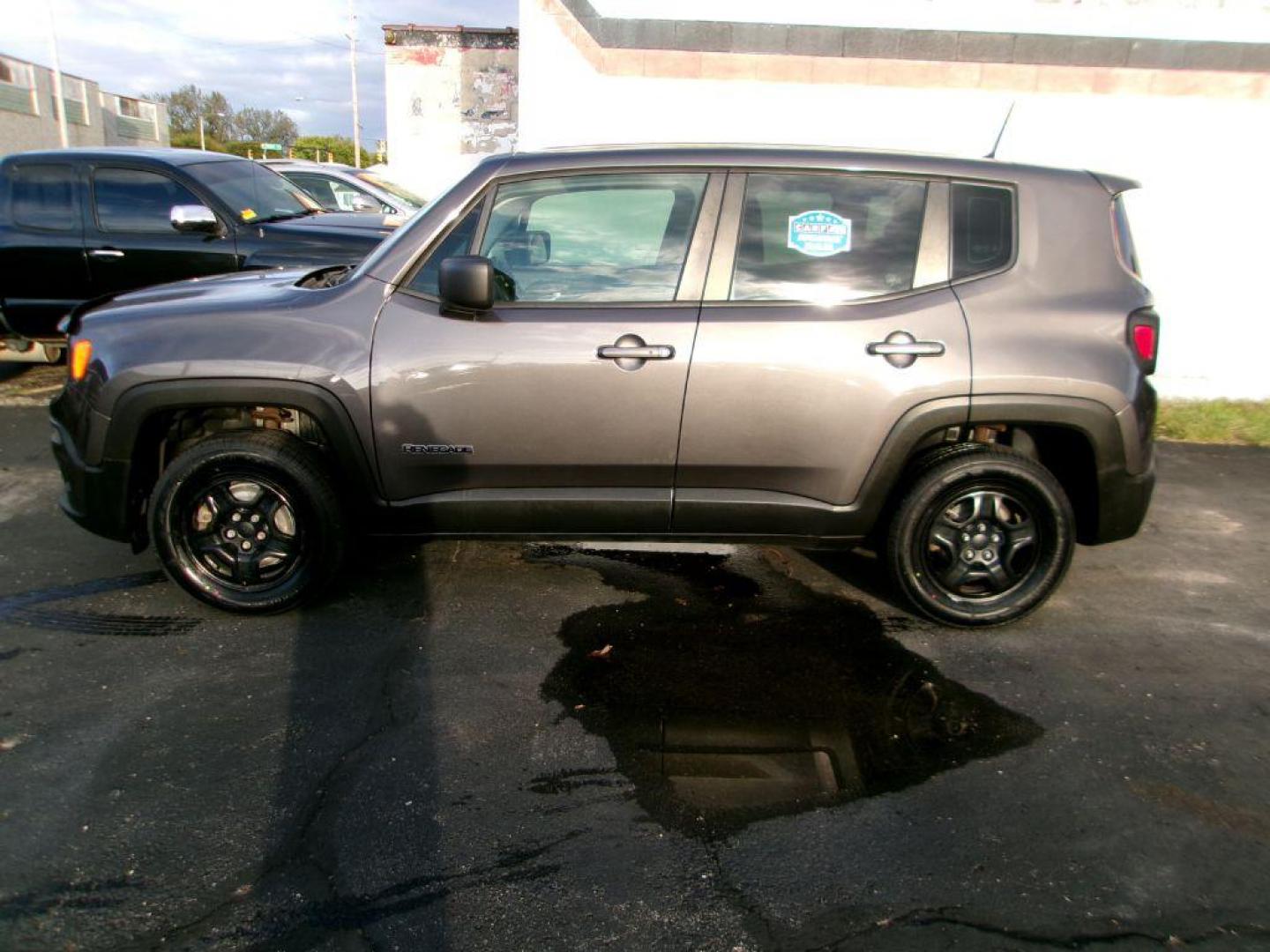 2017 GRAY JEEP RENEGADE SPORT (ZACCJBAB7HP) with an 2.4L engine, Automatic transmission, located at 501 E. Columbia St., Springfield, OH, 45503, (800) 262-7122, 39.925262, -83.801796 - *** Clean CarFax w/ 20 Service Records *** Sport *** 4x4 *** Serviced and Detailed *** Low Miles *** Jay North Auto has offered hand picked vehicles since 1965! Our customer's enjoy a NO pressure buying experience with a small town feel. All of our vehicles get fully inspected and detailed. We a - Photo#3