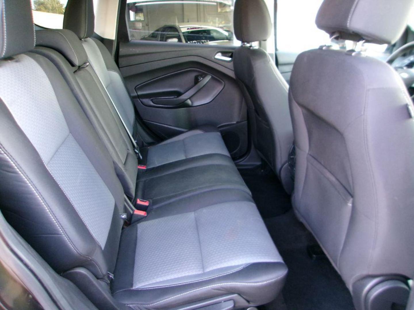 2017 BLACK FORD ESCAPE SE (1FMCU9G91HU) with an 2.0L engine, Automatic transmission, located at 501 E. Columbia St., Springfield, OH, 45503, (800) 262-7122, 39.925262, -83.801796 - ***Clean Carfax***New Front and Rear Brake Pads and Rotors***New Tires***AWD***EcoBoost***SE***Heated Seats***Serviced and Detailed*** Jay North Auto has offered hand picked vehicles since 1965! Our customer's enjoy a NO pressure buying experience with a small town feel. All of our vehicles ge - Photo#14