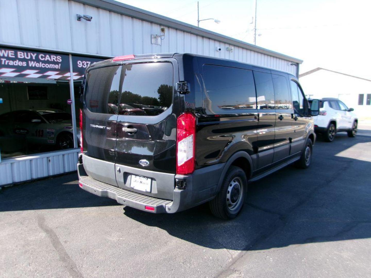 2018 BLACK FORD TRANSIT T-150 (1FTYE1ZM7JK) with an 3.7L engine, Automatic transmission, located at 501 E. Columbia St., Springfield, OH, 45503, (800) 262-7122, 39.925262, -83.801796 - ***1-Owner***T-150***Tinted Glass***New Front Brakes***Back-up Camera***Serviced and Detailed*** Jay North Auto has offered hand picked vehicles since 1965! Our customer's enjoy a NO pressure buying experience with a small town feel. All of our vehicles get fully inspected and detailed. We are - Photo#3
