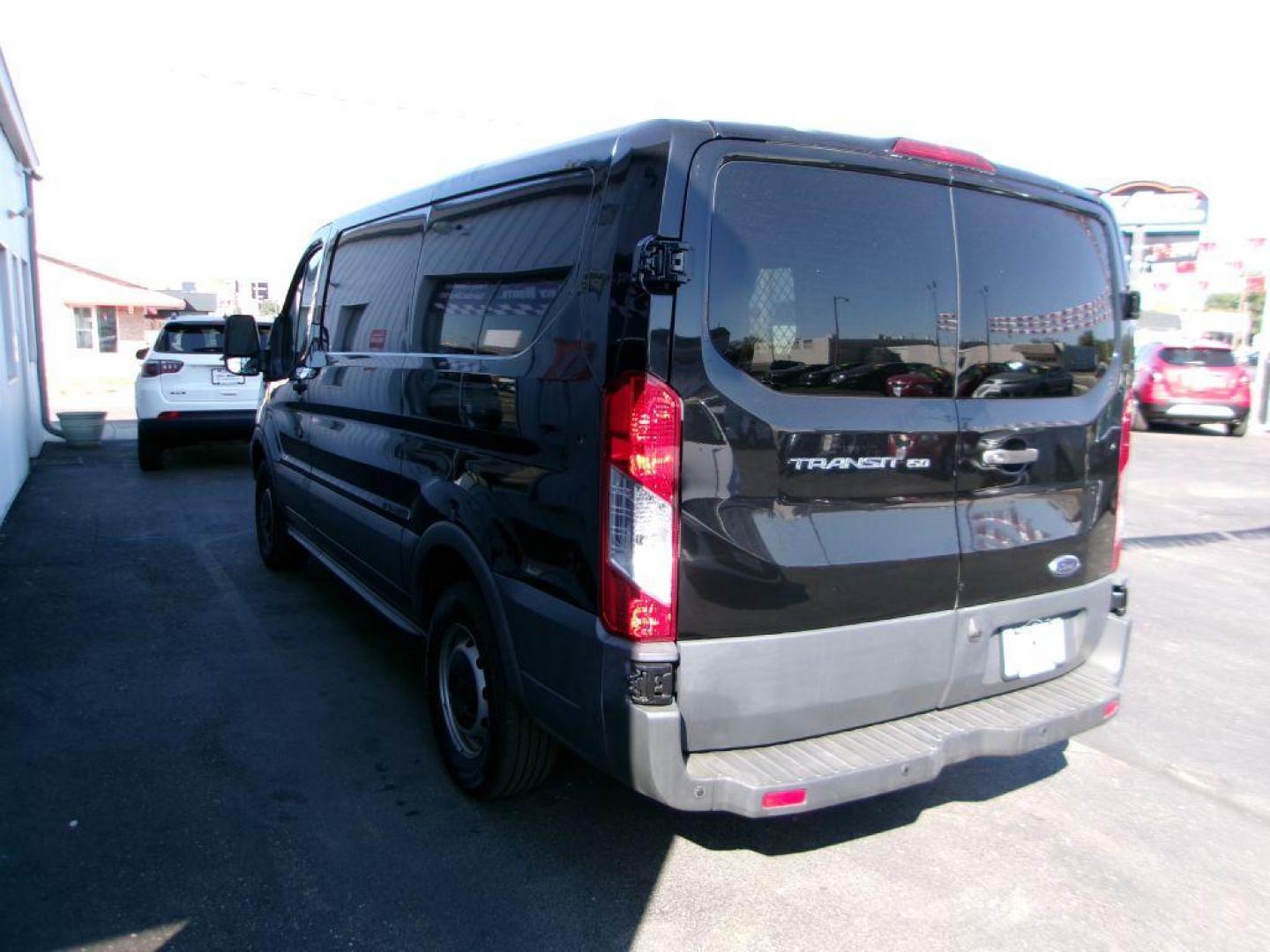 2018 BLACK FORD TRANSIT T-150 (1FTYE1ZM7JK) with an 3.7L engine, Automatic transmission, located at 501 E. Columbia St., Springfield, OH, 45503, (800) 262-7122, 39.925262, -83.801796 - ***1-Owner***T-150***Tinted Glass***New Front Brakes***Back-up Camera***Serviced and Detailed*** Jay North Auto has offered hand picked vehicles since 1965! Our customer's enjoy a NO pressure buying experience with a small town feel. All of our vehicles get fully inspected and detailed. We are - Photo#5