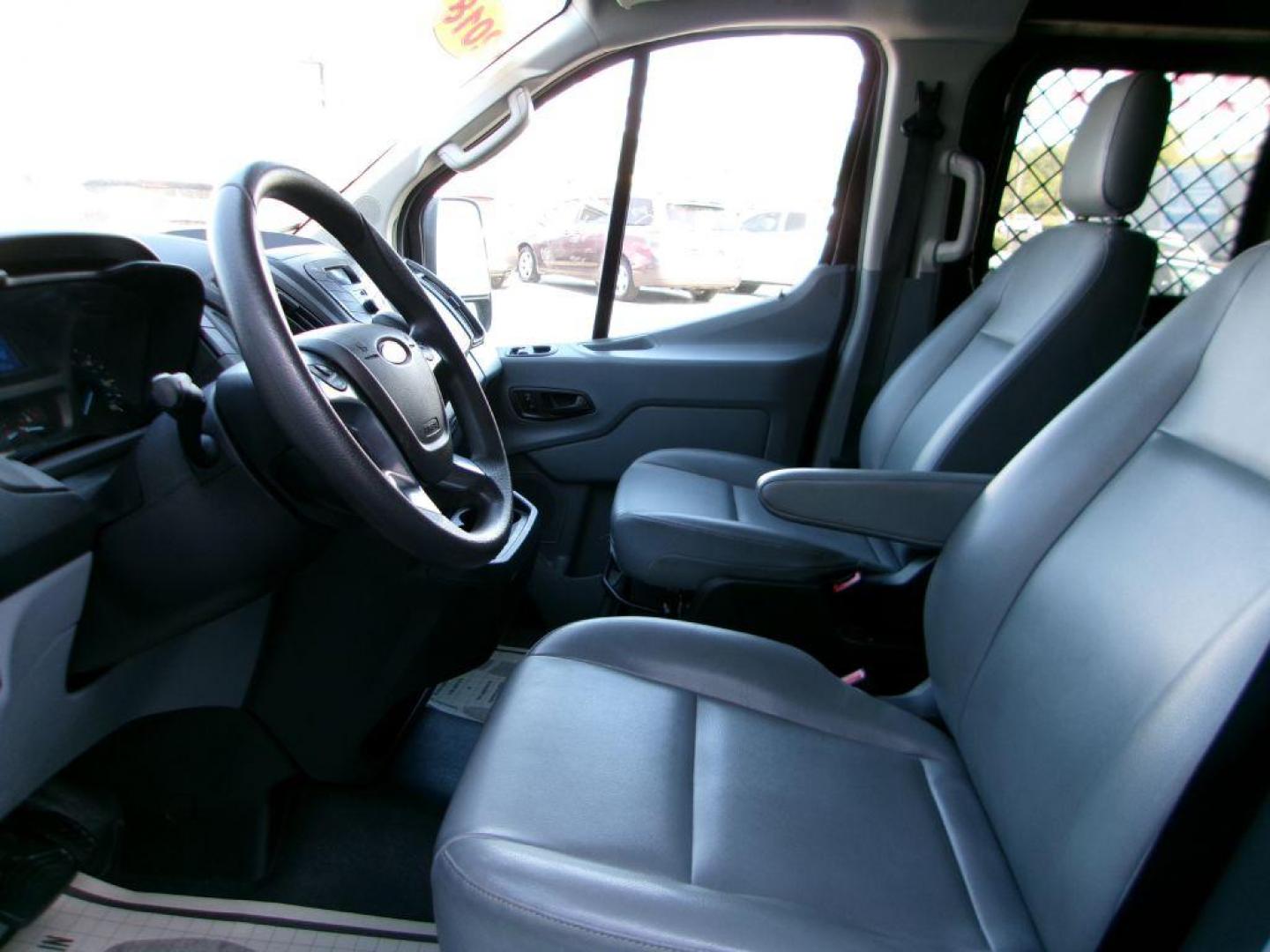 2018 BLACK FORD TRANSIT T-150 (1FTYE1ZM7JK) with an 3.7L engine, Automatic transmission, located at 501 E. Columbia St., Springfield, OH, 45503, (800) 262-7122, 39.925262, -83.801796 - ***1-Owner***T-150***Tinted Glass***New Front Brakes***Back-up Camera***Serviced and Detailed*** Jay North Auto has offered hand picked vehicles since 1965! Our customer's enjoy a NO pressure buying experience with a small town feel. All of our vehicles get fully inspected and detailed. We are - Photo#8