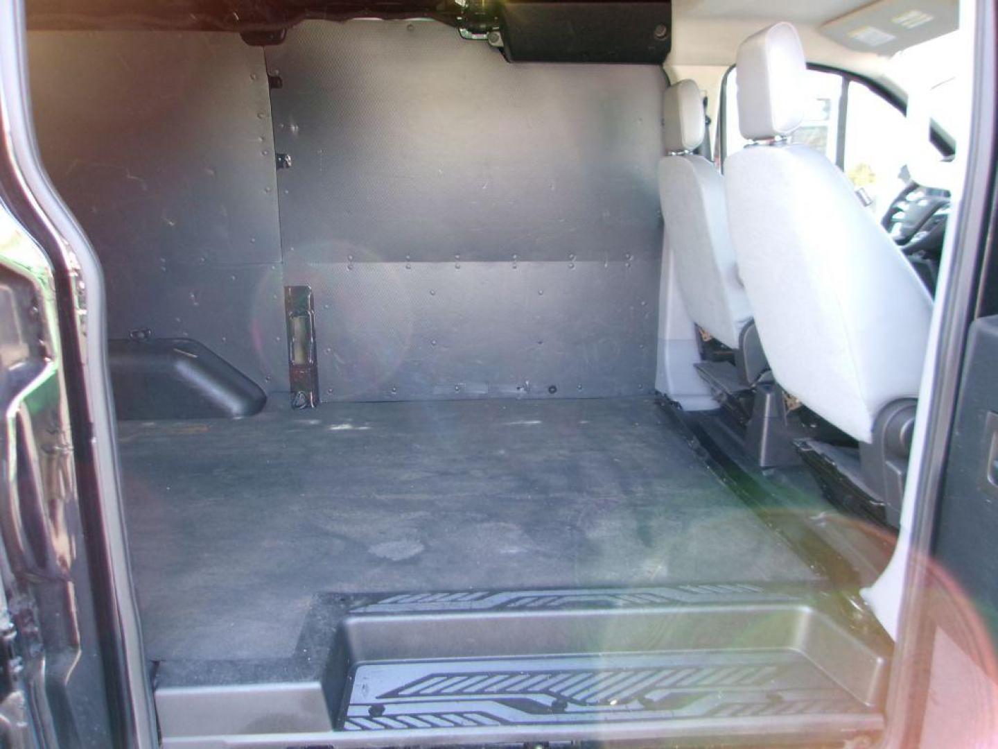 2018 BLACK FORD TRANSIT T-150 (1FTYE1ZM7JK) with an 3.7L engine, Automatic transmission, located at 501 E. Columbia St., Springfield, OH, 45503, (800) 262-7122, 39.925262, -83.801796 - ***1-Owner***T-150***Tinted Glass***New Front Brakes***Back-up Camera***Serviced and Detailed*** Jay North Auto has offered hand picked vehicles since 1965! Our customer's enjoy a NO pressure buying experience with a small town feel. All of our vehicles get fully inspected and detailed. We are - Photo#13