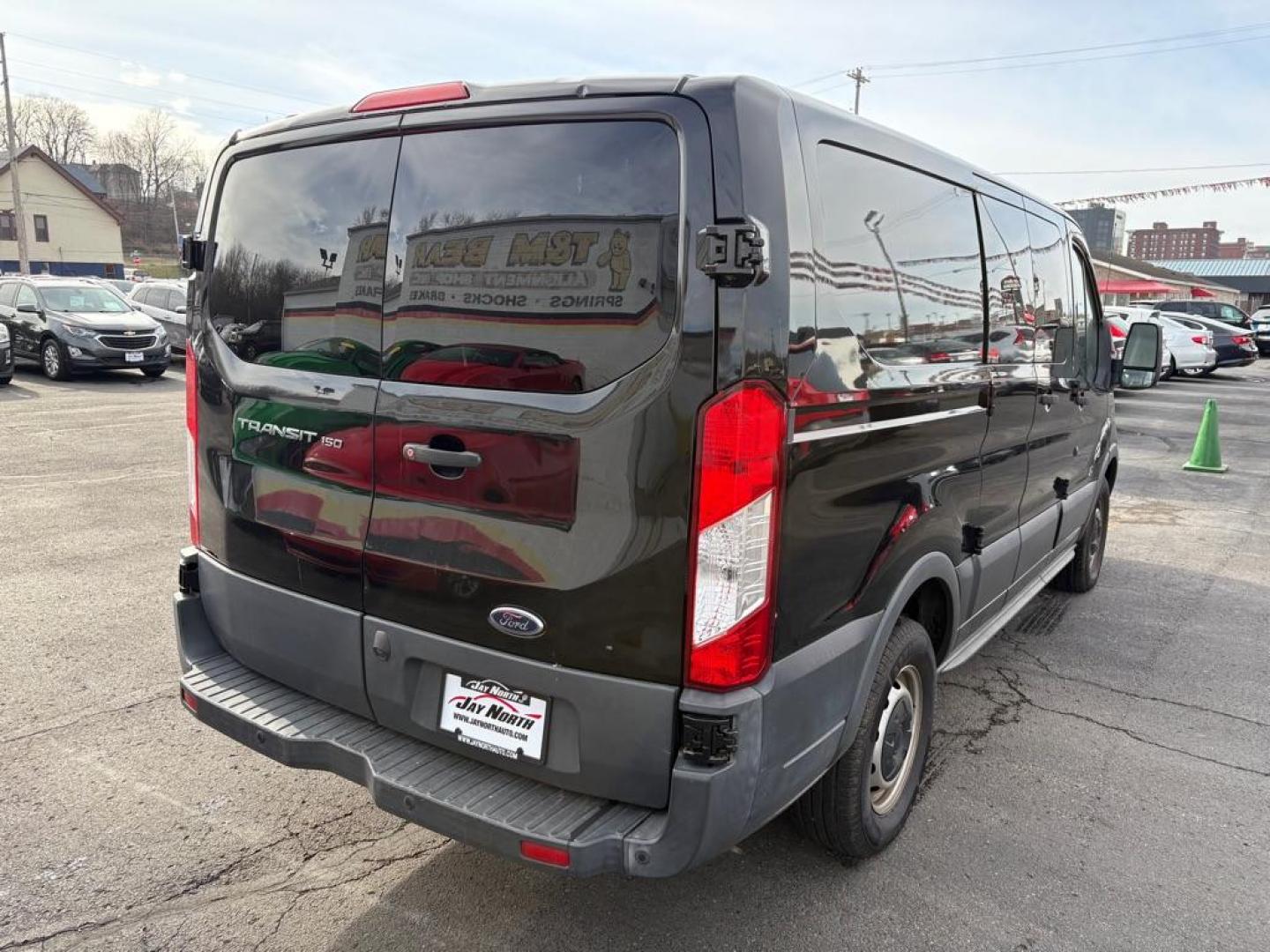 2018 BLACK FORD TRANSIT T-150 (1FTYE1ZM7JK) with an 3.7L engine, Automatic transmission, located at 501 E. Columbia St., Springfield, OH, 45503, (800) 262-7122, 39.925262, -83.801796 - ***1-Owner***T-150***Tinted Glass***New Front Brakes***Back-up Camera***Serviced and Detailed*** Jay North Auto has offered hand picked vehicles since 1965! Our customer's enjoy a NO pressure buying experience with a small town feel. All of our vehicles get fully inspected and detailed. We are - Photo#2