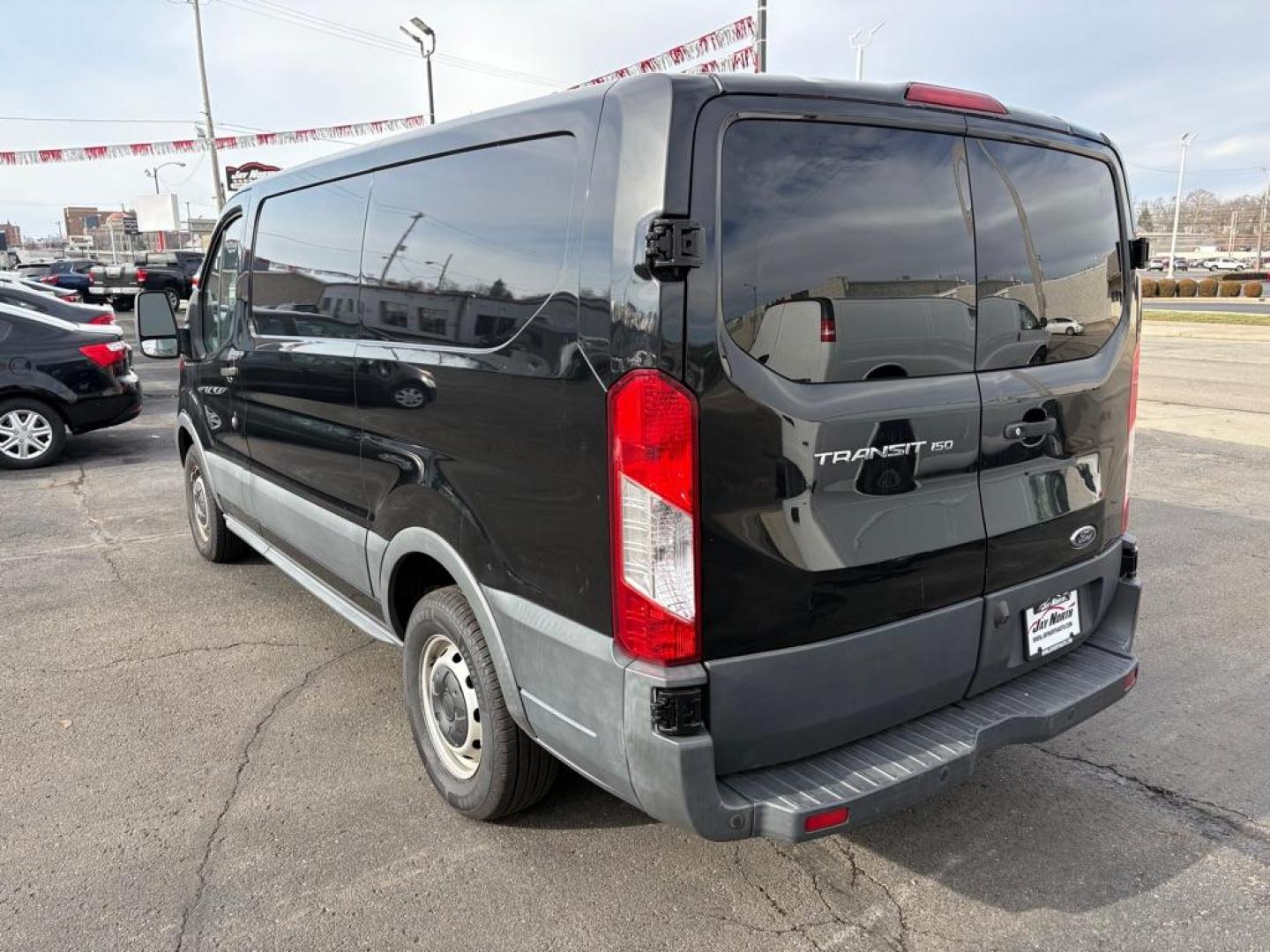 2018 BLACK FORD TRANSIT T-150 (1FTYE1ZM7JK) with an 3.7L engine, Automatic transmission, located at 501 E. Columbia St., Springfield, OH, 45503, (800) 262-7122, 39.925262, -83.801796 - ***1-Owner***T-150***Tinted Glass***New Front Brakes***Back-up Camera***Serviced and Detailed*** Jay North Auto has offered hand picked vehicles since 1965! Our customer's enjoy a NO pressure buying experience with a small town feel. All of our vehicles get fully inspected and detailed. We are - Photo#4