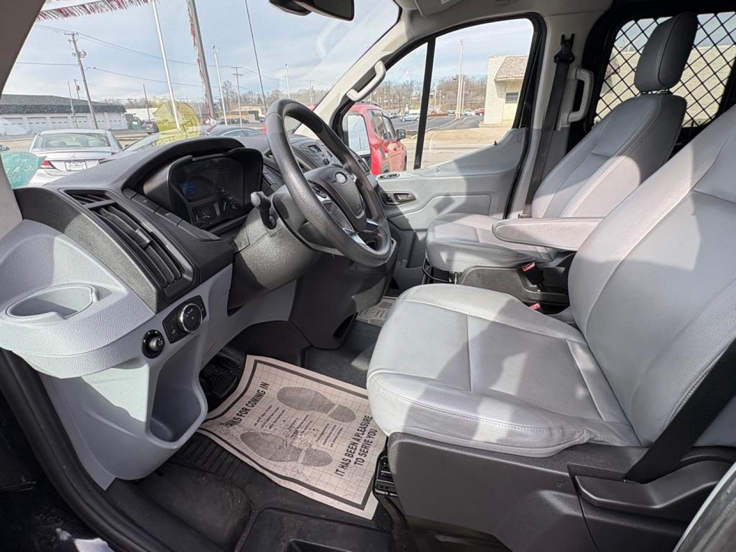 2018 BLACK FORD TRANSIT T-150 (1FTYE1ZM7JK) with an 3.7L engine, Automatic transmission, located at 501 E. Columbia St., Springfield, OH, 45503, (800) 262-7122, 39.925262, -83.801796 - ***1-Owner***T-150***Tinted Glass***New Front Brakes***Back-up Camera***Serviced and Detailed*** Jay North Auto has offered hand picked vehicles since 1965! Our customer's enjoy a NO pressure buying experience with a small town feel. All of our vehicles get fully inspected and detailed. We are - Photo#7