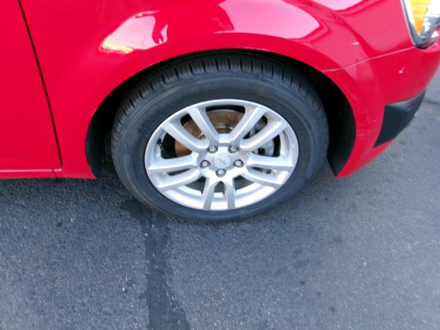 2013 RED CHEVROLET SONIC LT (1G1JC6SH7D4) with an 1.8L engine, Automatic transmission, located at 501 E. Columbia St., Springfield, OH, 45503, (800) 262-7122, 39.925262, -83.801796 - *** New Tires *** LT *** New Brakes *** New Wipers *** Serviced and Detailed *** Jay North Auto has offered hand picked vehicles since 1965! Our customer's enjoy a NO pressure buying experience with a small town feel. All of our vehicles get fully inspected and detailed. We are a preferred deal - Photo#2