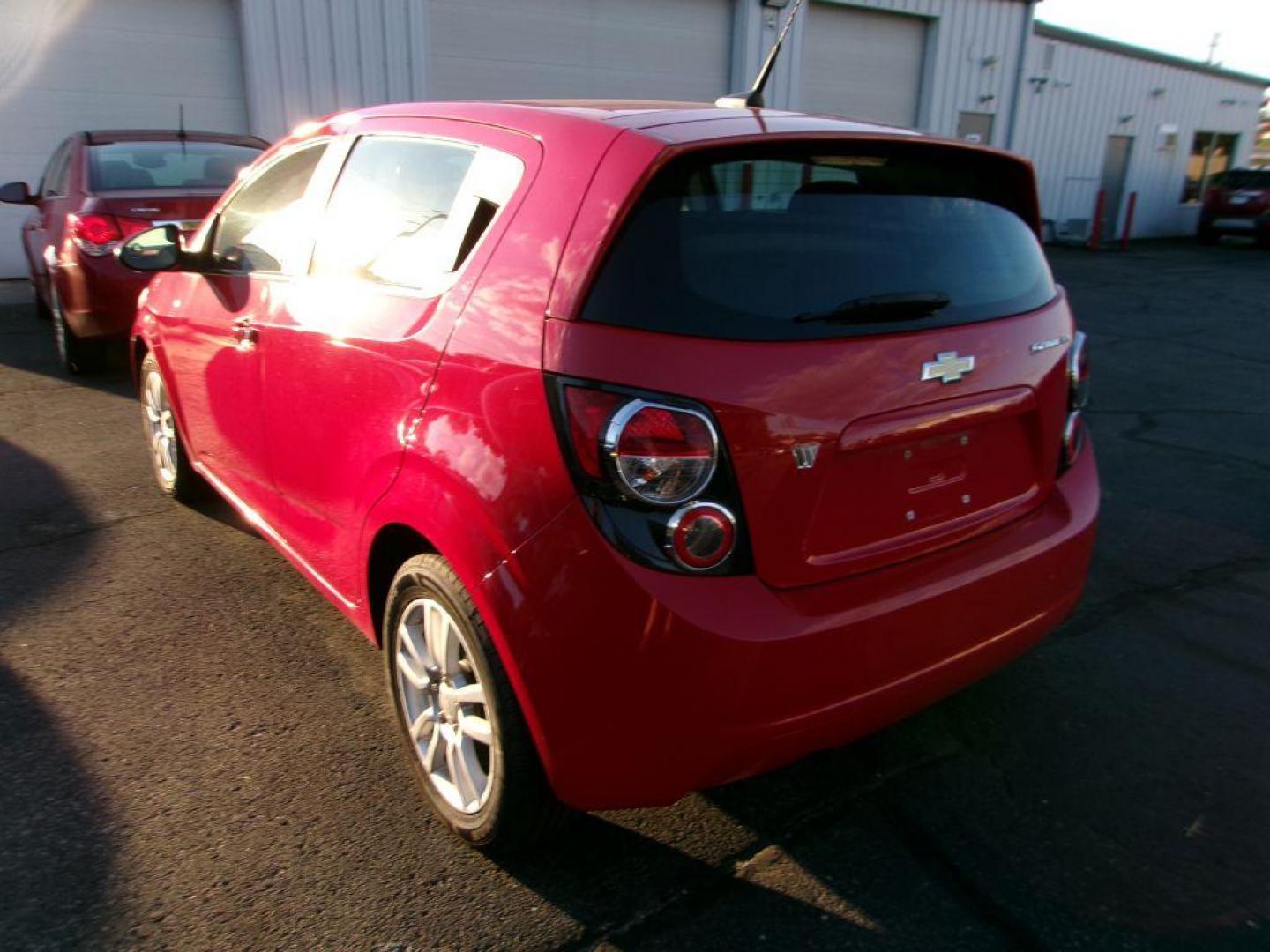 2013 RED CHEVROLET SONIC LT (1G1JC6SH7D4) with an 1.8L engine, Automatic transmission, located at 501 E. Columbia St., Springfield, OH, 45503, (800) 262-7122, 39.925262, -83.801796 - *** New Tires *** LT *** New Brakes *** New Wipers *** Serviced and Detailed *** Jay North Auto has offered hand picked vehicles since 1965! Our customer's enjoy a NO pressure buying experience with a small town feel. All of our vehicles get fully inspected and detailed. We are a preferred deal - Photo#3