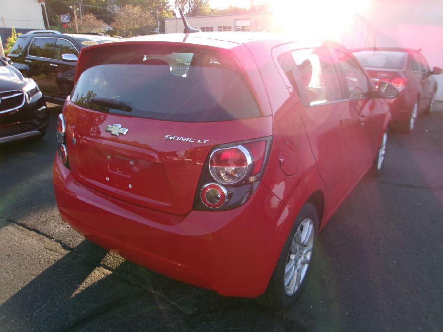 2013 RED CHEVROLET SONIC LT (1G1JC6SH7D4) with an 1.8L engine, Automatic transmission, located at 501 E. Columbia St., Springfield, OH, 45503, (800) 262-7122, 39.925262, -83.801796 - *** New Tires *** LT *** New Brakes *** New Wipers *** Serviced and Detailed *** Jay North Auto has offered hand picked vehicles since 1965! Our customer's enjoy a NO pressure buying experience with a small town feel. All of our vehicles get fully inspected and detailed. We are a preferred deal - Photo#5