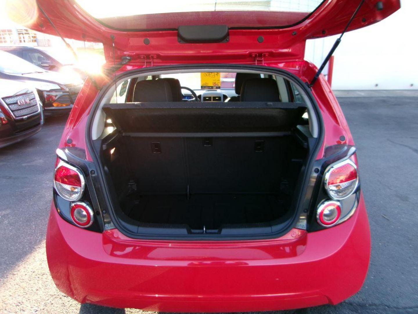 2013 RED CHEVROLET SONIC LT (1G1JC6SH7D4) with an 1.8L engine, Automatic transmission, located at 501 E. Columbia St., Springfield, OH, 45503, (800) 262-7122, 39.925262, -83.801796 - *** New Tires *** LT *** New Brakes *** New Wipers *** Serviced and Detailed *** Jay North Auto has offered hand picked vehicles since 1965! Our customer's enjoy a NO pressure buying experience with a small town feel. All of our vehicles get fully inspected and detailed. We are a preferred deal - Photo#6