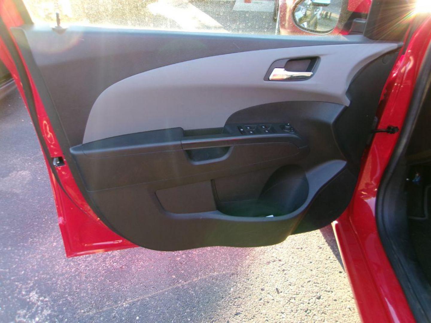 2013 RED CHEVROLET SONIC LT (1G1JC6SH7D4) with an 1.8L engine, Automatic transmission, located at 501 E. Columbia St., Springfield, OH, 45503, (800) 262-7122, 39.925262, -83.801796 - *** New Tires *** LT *** New Brakes *** New Wipers *** Serviced and Detailed *** Jay North Auto has offered hand picked vehicles since 1965! Our customer's enjoy a NO pressure buying experience with a small town feel. All of our vehicles get fully inspected and detailed. We are a preferred deal - Photo#10