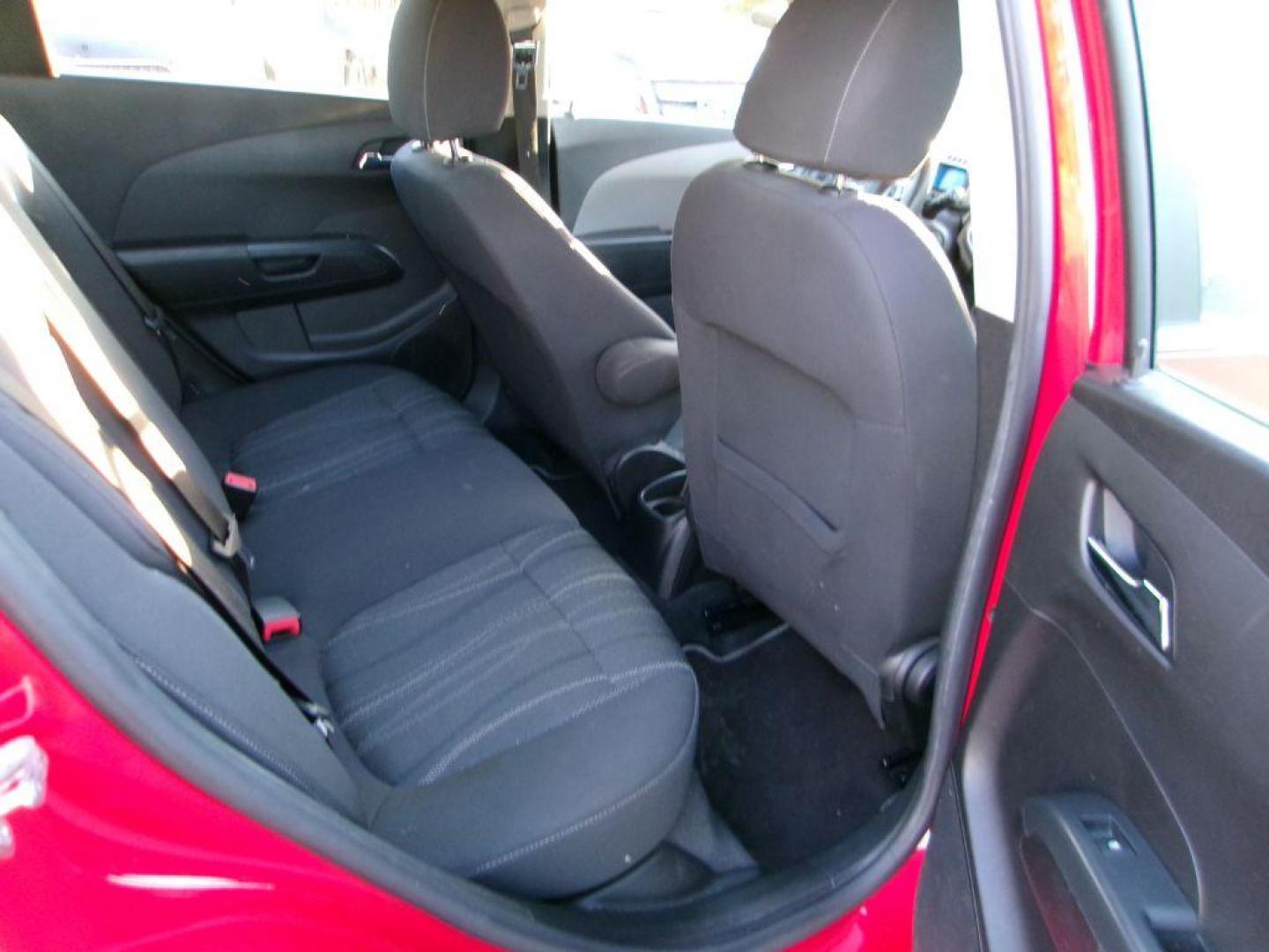 2013 RED CHEVROLET SONIC LT (1G1JC6SH7D4) with an 1.8L engine, Automatic transmission, located at 501 E. Columbia St., Springfield, OH, 45503, (800) 262-7122, 39.925262, -83.801796 - *** New Tires *** LT *** New Brakes *** New Wipers *** Serviced and Detailed *** Jay North Auto has offered hand picked vehicles since 1965! Our customer's enjoy a NO pressure buying experience with a small town feel. All of our vehicles get fully inspected and detailed. We are a preferred deal - Photo#12