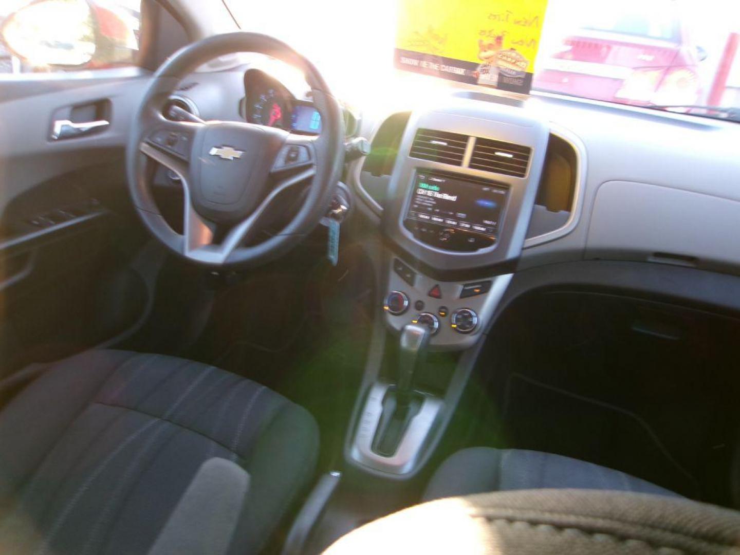 2013 RED CHEVROLET SONIC LT (1G1JC6SH7D4) with an 1.8L engine, Automatic transmission, located at 501 E. Columbia St., Springfield, OH, 45503, (800) 262-7122, 39.925262, -83.801796 - *** New Tires *** LT *** New Brakes *** New Wipers *** Serviced and Detailed *** Jay North Auto has offered hand picked vehicles since 1965! Our customer's enjoy a NO pressure buying experience with a small town feel. All of our vehicles get fully inspected and detailed. We are a preferred deal - Photo#13