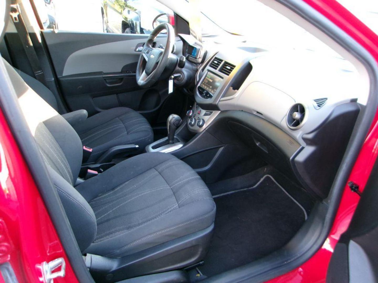 2013 RED CHEVROLET SONIC LT (1G1JC6SH7D4) with an 1.8L engine, Automatic transmission, located at 501 E. Columbia St., Springfield, OH, 45503, (800) 262-7122, 39.925262, -83.801796 - *** New Tires *** LT *** New Brakes *** New Wipers *** Serviced and Detailed *** Jay North Auto has offered hand picked vehicles since 1965! Our customer's enjoy a NO pressure buying experience with a small town feel. All of our vehicles get fully inspected and detailed. We are a preferred deal - Photo#14
