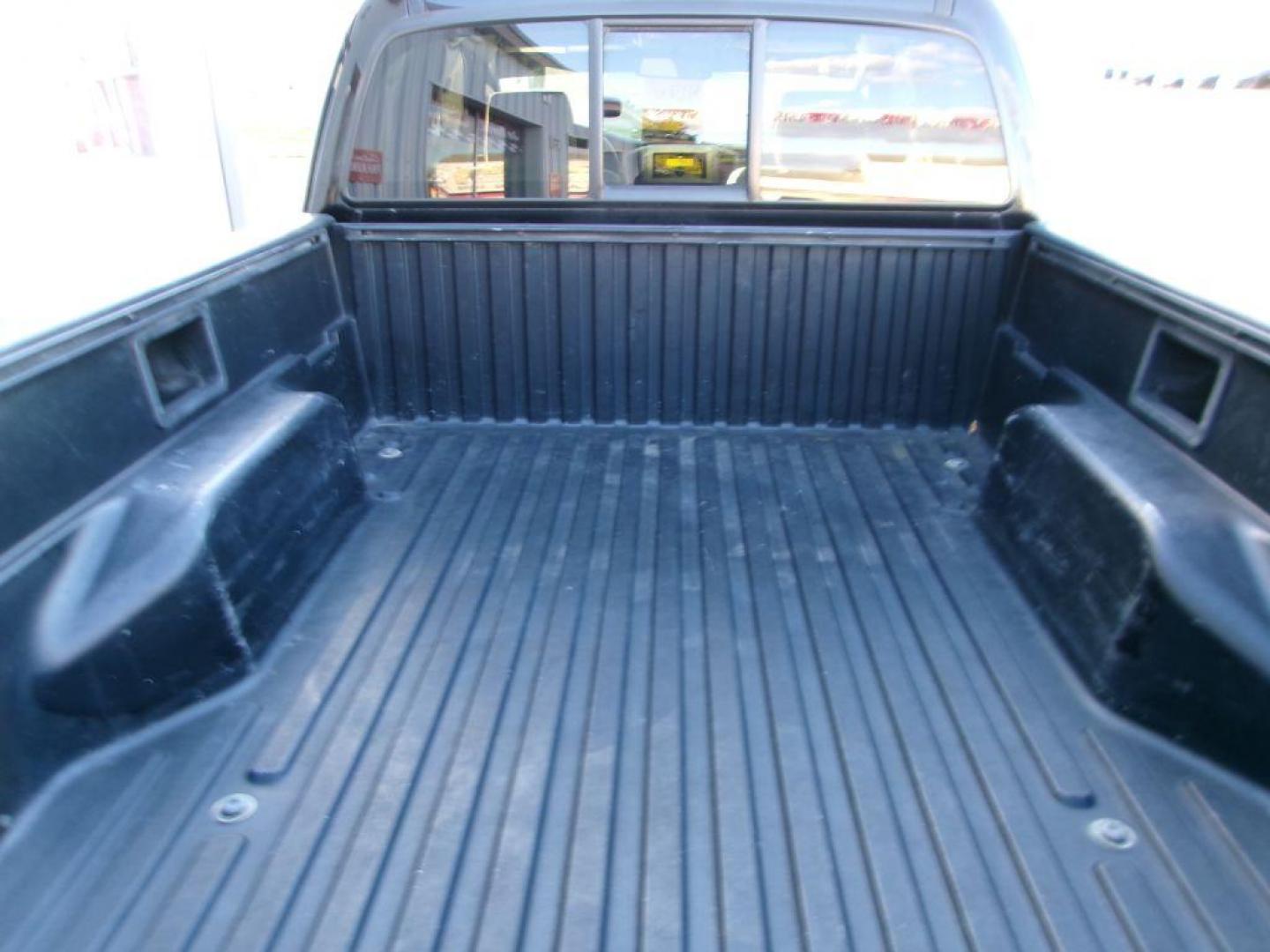 2006 BLACK TOYOTA TACOMA ACCESS CAB (5TETX22N76Z) with an 2.7L engine, Automatic transmission, located at 501 E. Columbia St., Springfield, OH, 45503, (800) 262-7122, 39.925262, -83.801796 - *** New Tires *** New Rack and Pinion *** Serviced and Detailed *** Bedliner *** Clean Frame *** Jay North Auto has offered hand picked vehicles since 1965! Our customer's enjoy a NO pressure buying experience with a small town feel. All of our vehicles get fully inspected and detailed. We are - Photo#6