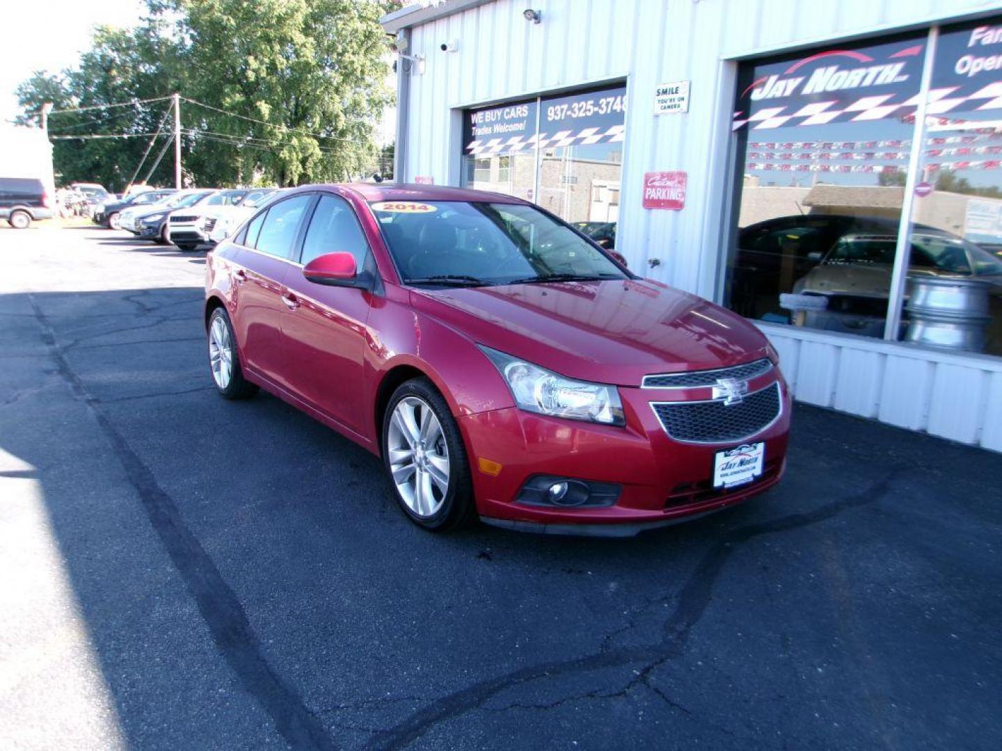2014 RED CHEVROLET CRUZE LTZ (1G1PG5SB1E7) with an 1.4L engine, Automatic transmission, located at 501 E. Columbia St., Springfield, OH, 45503, (800) 262-7122, 39.925262, -83.801796 - *** LOW MILES *** LTZ *** Remote Start *** Leather *** New Brakes *** Like New Tires *** Serviced and Detailed *** Jay North Auto has offered hand picked vehicles since 1965! Our customer's enjoy a NO pressure buying experience with a small town feel. All of our vehicles get fully inspected and - Photo#0