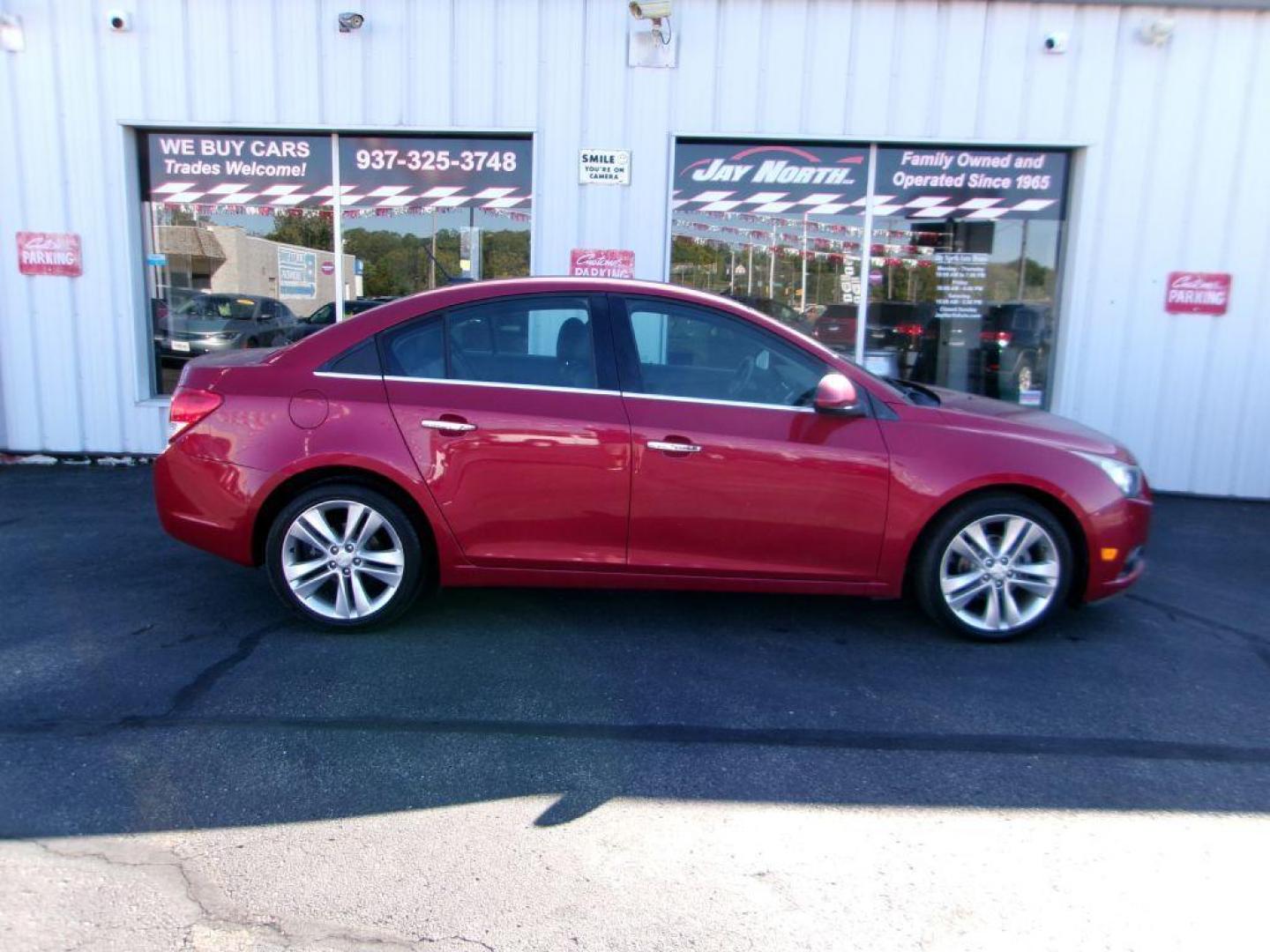 2014 RED CHEVROLET CRUZE LTZ (1G1PG5SB1E7) with an 1.4L engine, Automatic transmission, located at 501 E. Columbia St., Springfield, OH, 45503, (800) 262-7122, 39.925262, -83.801796 - *** LOW MILES *** LTZ *** Remote Start *** Leather *** New Brakes *** Like New Tires *** Serviced and Detailed *** Jay North Auto has offered hand picked vehicles since 1965! Our customer's enjoy a NO pressure buying experience with a small town feel. All of our vehicles get fully inspected and - Photo#2