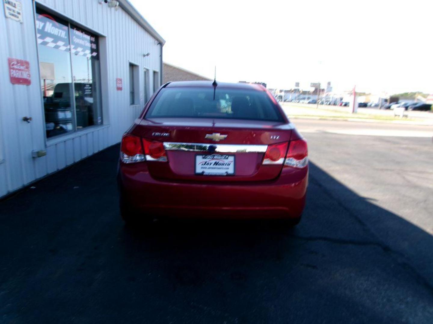 2014 RED CHEVROLET CRUZE LTZ (1G1PG5SB1E7) with an 1.4L engine, Automatic transmission, located at 501 E. Columbia St., Springfield, OH, 45503, (800) 262-7122, 39.925262, -83.801796 - *** LOW MILES *** LTZ *** Remote Start *** Leather *** New Brakes *** Like New Tires *** Serviced and Detailed *** Jay North Auto has offered hand picked vehicles since 1965! Our customer's enjoy a NO pressure buying experience with a small town feel. All of our vehicles get fully inspected and - Photo#4