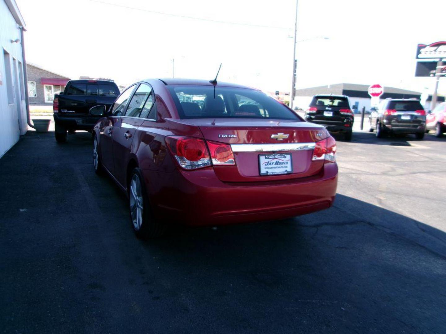 2014 RED CHEVROLET CRUZE LTZ (1G1PG5SB1E7) with an 1.4L engine, Automatic transmission, located at 501 E. Columbia St., Springfield, OH, 45503, (800) 262-7122, 39.925262, -83.801796 - *** LOW MILES *** LTZ *** Remote Start *** Leather *** New Brakes *** Like New Tires *** Serviced and Detailed *** Jay North Auto has offered hand picked vehicles since 1965! Our customer's enjoy a NO pressure buying experience with a small town feel. All of our vehicles get fully inspected and - Photo#5