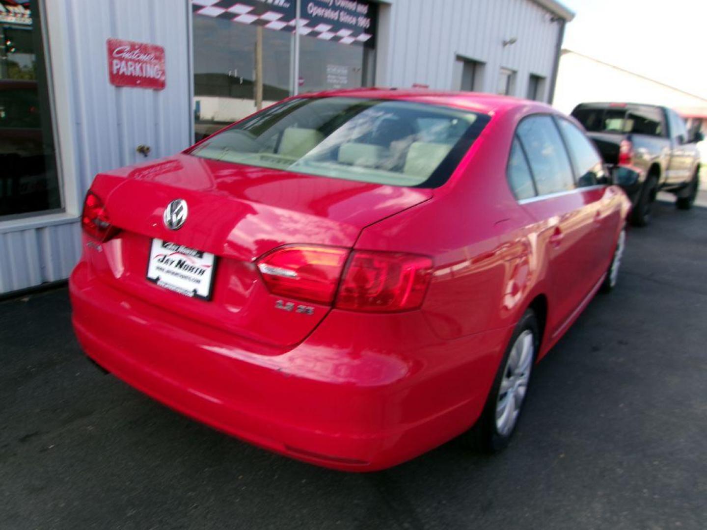 2013 RED VOLKSWAGEN JETTA SE (3VWDP7AJ9DM) with an 2.5L engine, Automatic transmission, located at 501 E. Columbia St., Springfield, OH, 45503, (800) 262-7122, 39.925262, -83.801796 - *** New Tires *** Tune Up *** New Brakes *** SE 2.5L *** Serviced and Detailed *** Leather *** Jay North Auto has offered hand picked vehicles since 1965! Our customer's enjoy a NO pressure buying experience with a small town feel. All of our vehicles get fully inspected and detailed. We are a - Photo#1