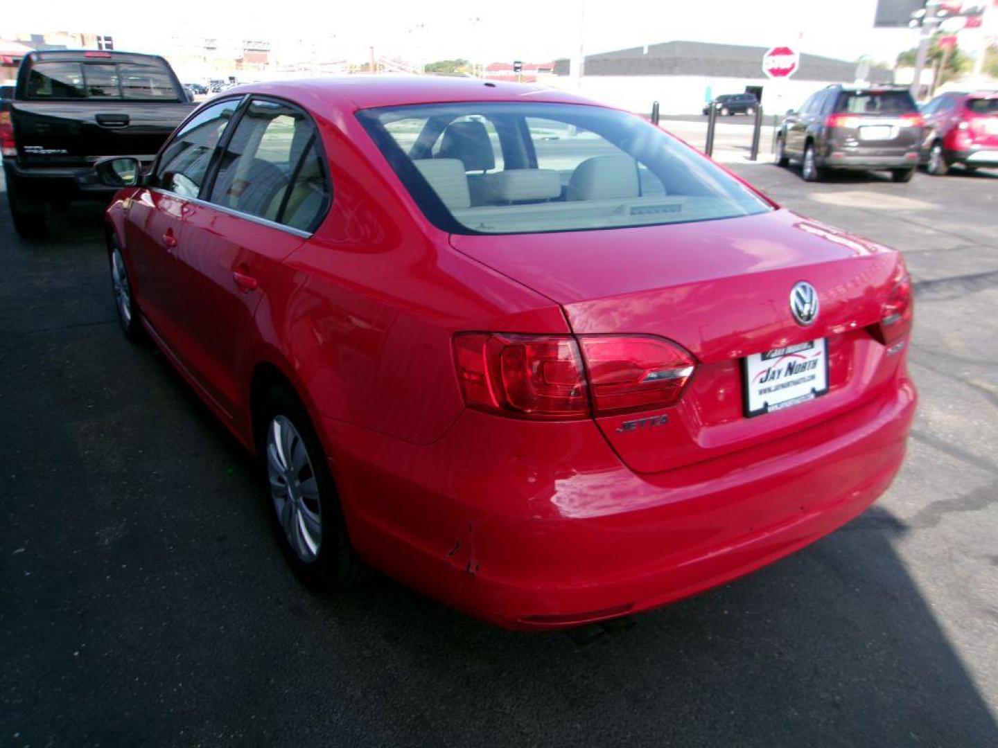 2013 RED VOLKSWAGEN JETTA SE (3VWDP7AJ9DM) with an 2.5L engine, Automatic transmission, located at 501 E. Columbia St., Springfield, OH, 45503, (800) 262-7122, 39.925262, -83.801796 - *** New Tires *** Tune Up *** New Brakes *** SE 2.5L *** Serviced and Detailed *** Leather *** Jay North Auto has offered hand picked vehicles since 1965! Our customer's enjoy a NO pressure buying experience with a small town feel. All of our vehicles get fully inspected and detailed. We are a - Photo#2