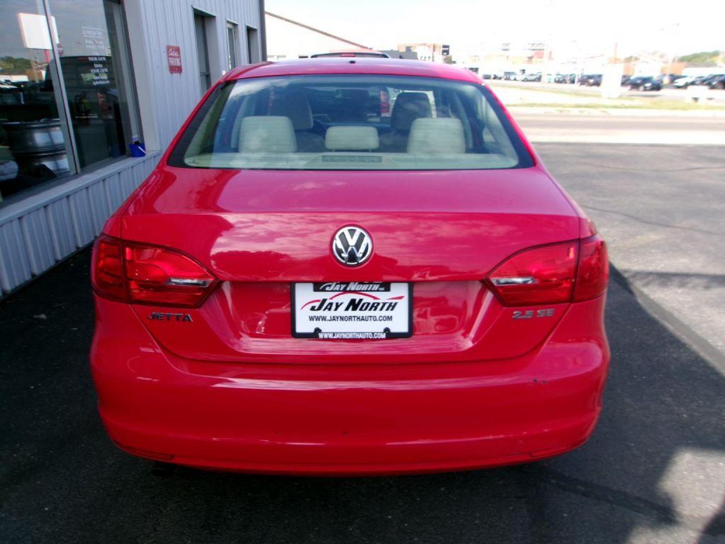 2013 RED VOLKSWAGEN JETTA SE (3VWDP7AJ9DM) with an 2.5L engine, Automatic transmission, located at 501 E. Columbia St., Springfield, OH, 45503, (800) 262-7122, 39.925262, -83.801796 - *** New Tires *** Tune Up *** New Brakes *** SE 2.5L *** Serviced and Detailed *** Leather *** Jay North Auto has offered hand picked vehicles since 1965! Our customer's enjoy a NO pressure buying experience with a small town feel. All of our vehicles get fully inspected and detailed. We are a - Photo#3